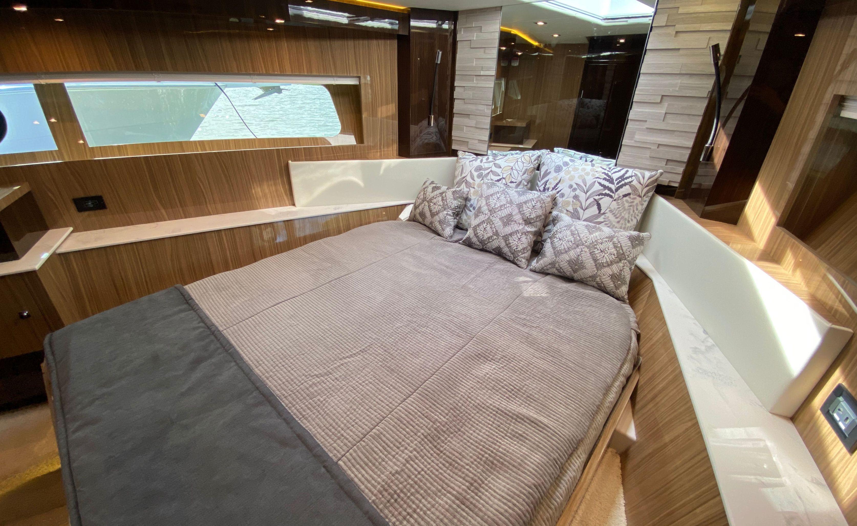 Cruisers Yachts-60 Fly 2022-RADIANT NY-US-Luxurious bedroom interior of 2022 Cruisers Yachts 60 Fly with elegant wood finish.-9652120 | Thumbnail