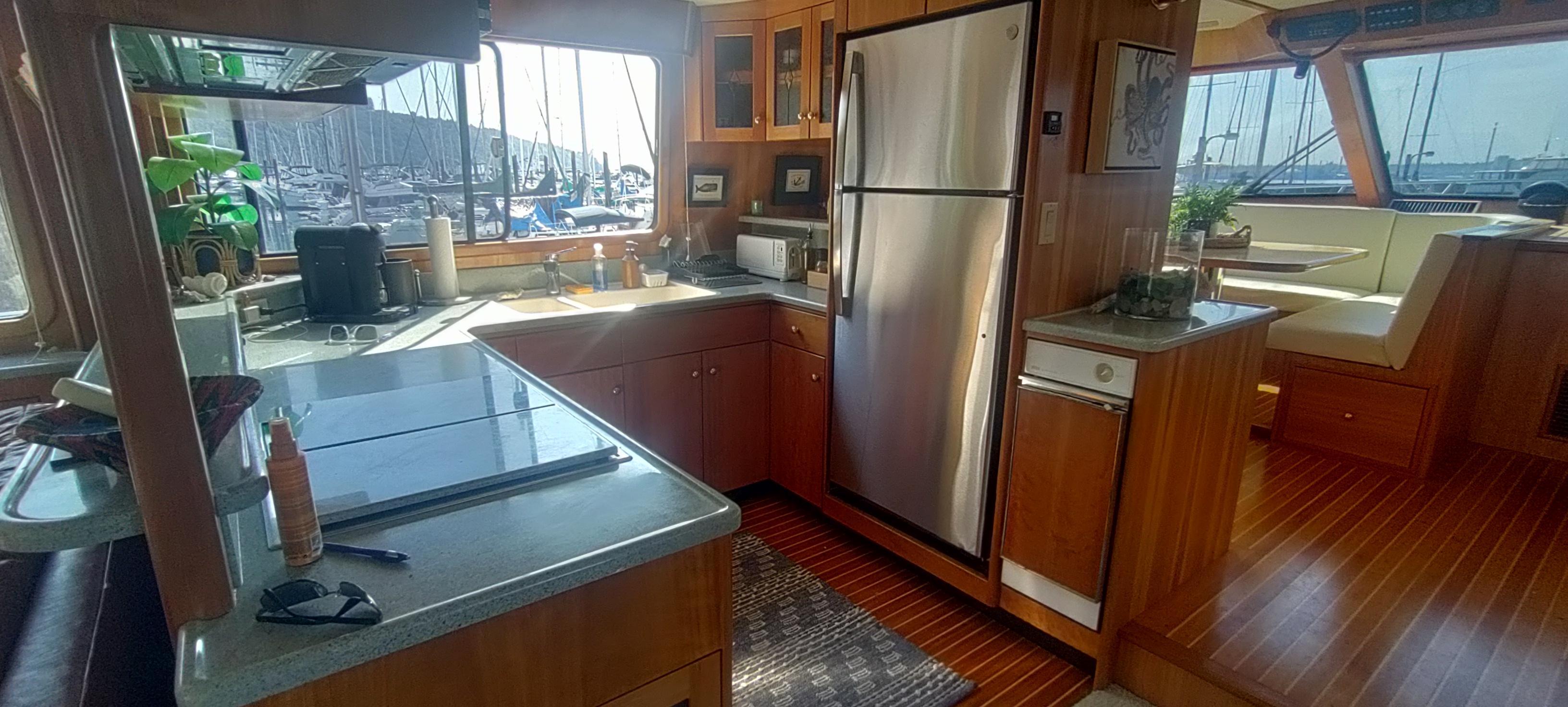 1996 Wendon 72 Skylounge #TBBJW72 inventory image at Sun Country Marine Group, Seattle, WA 1996 Wendon 72 Skylounge #TBBJW72 inventory image at Sun Country Marine Group, Seattle, WA