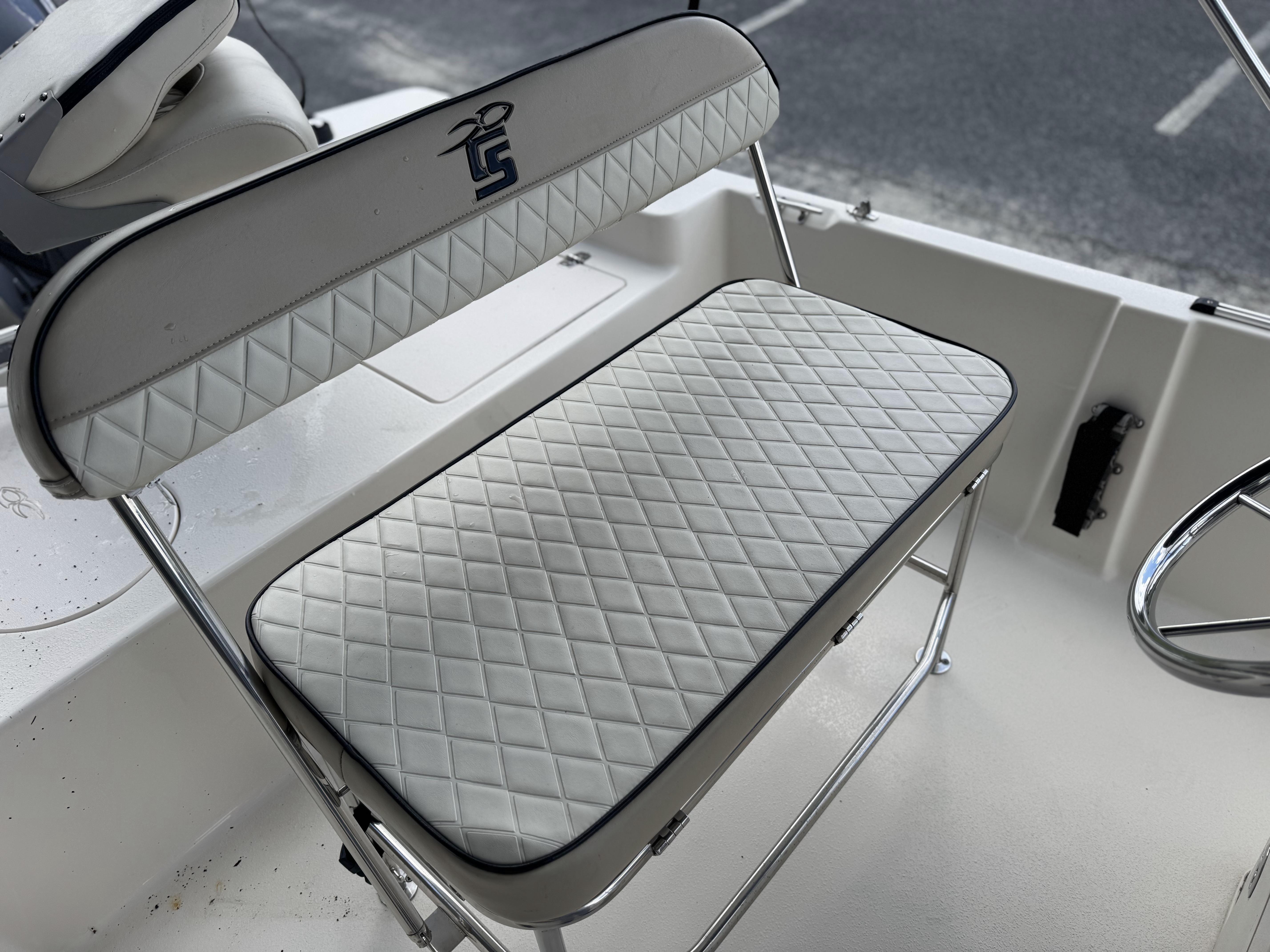 2020 Carolina Skiff 178JLS boat seat with diamond-patterned upholstery and chrome frame.