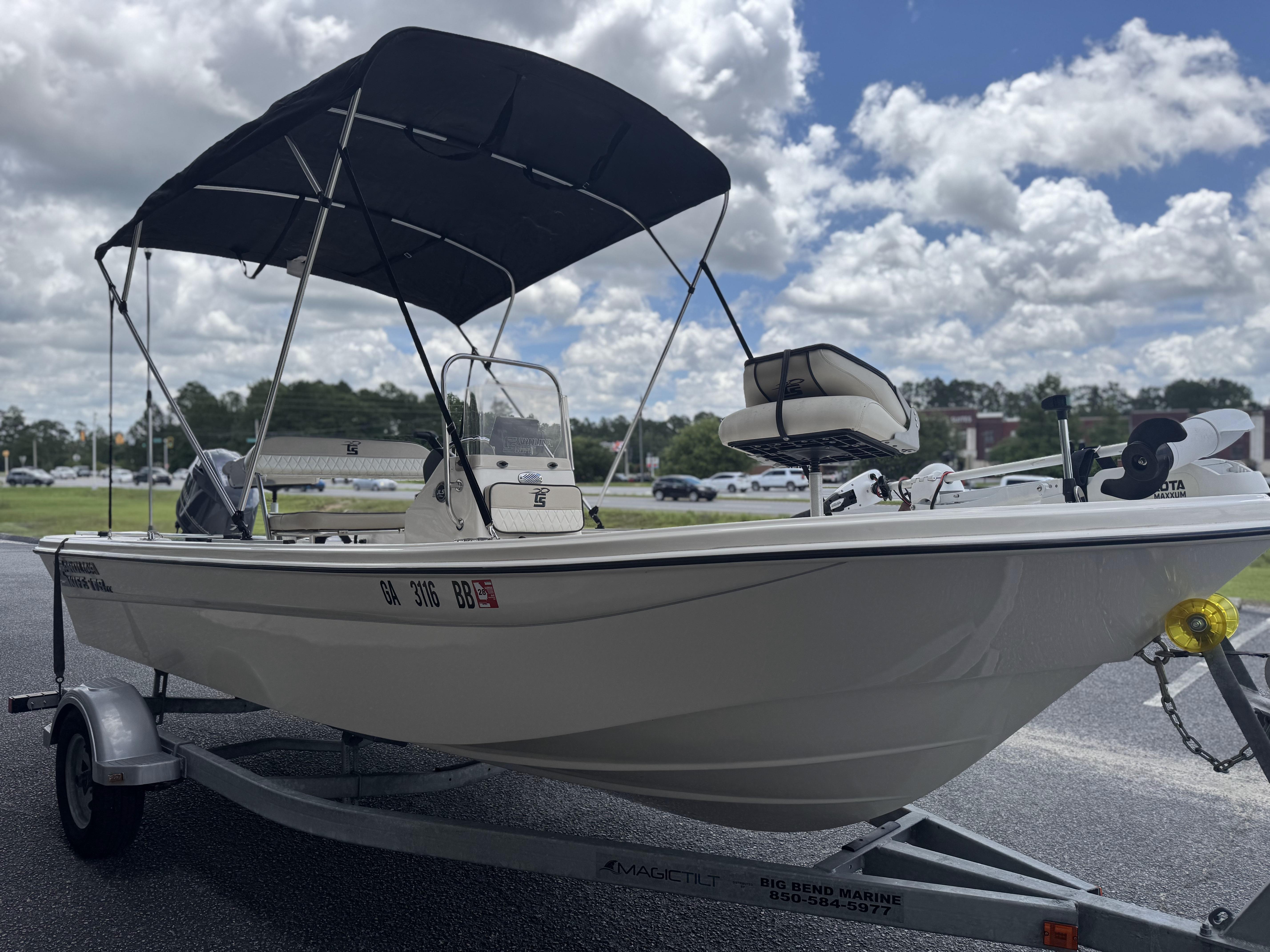 2020 Carolina Skiff 178JLS boat on trailer with canopy, parked outdoors.
