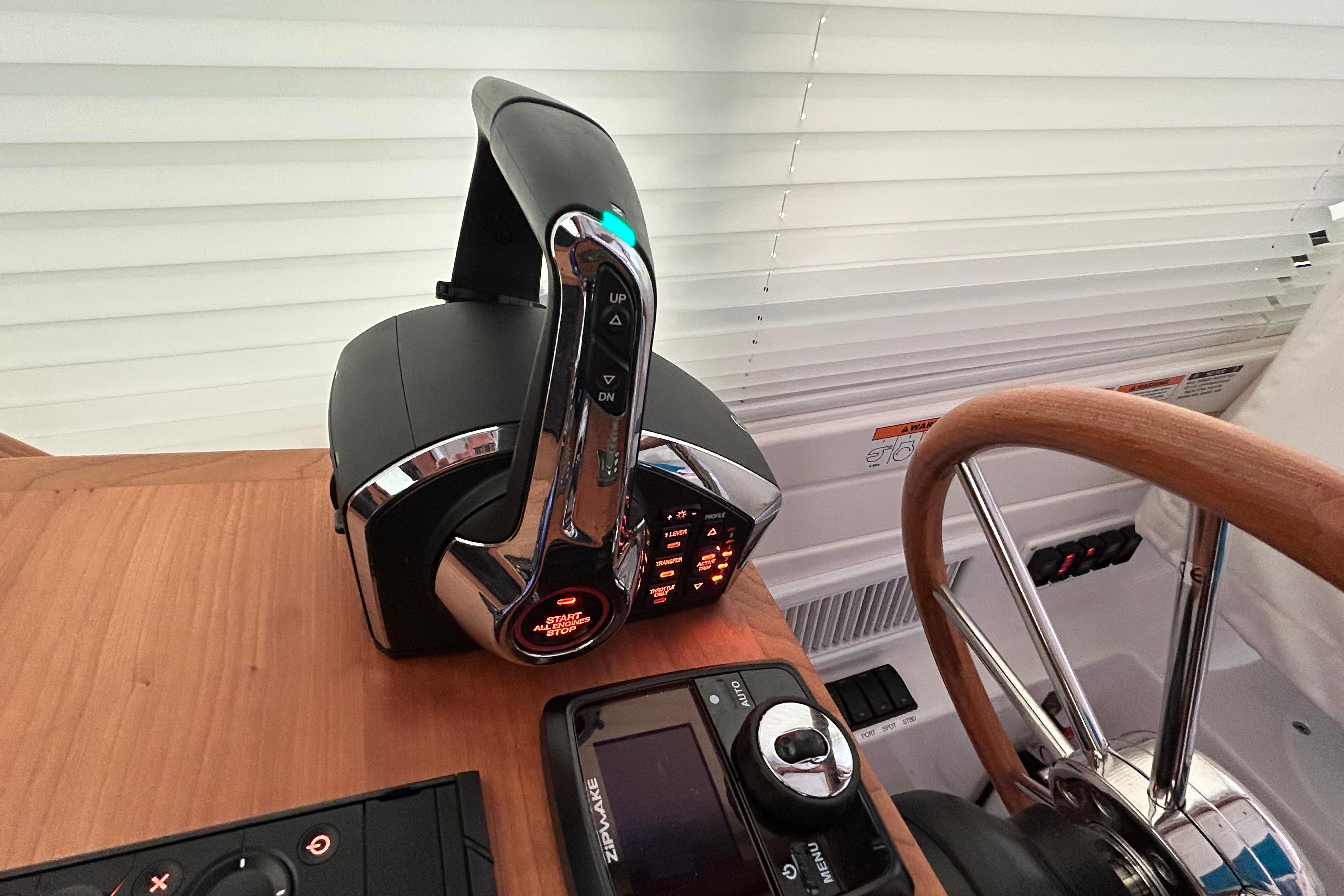 Control panel of 2023 Back Cove 39O boat with throttle and Zip Wake