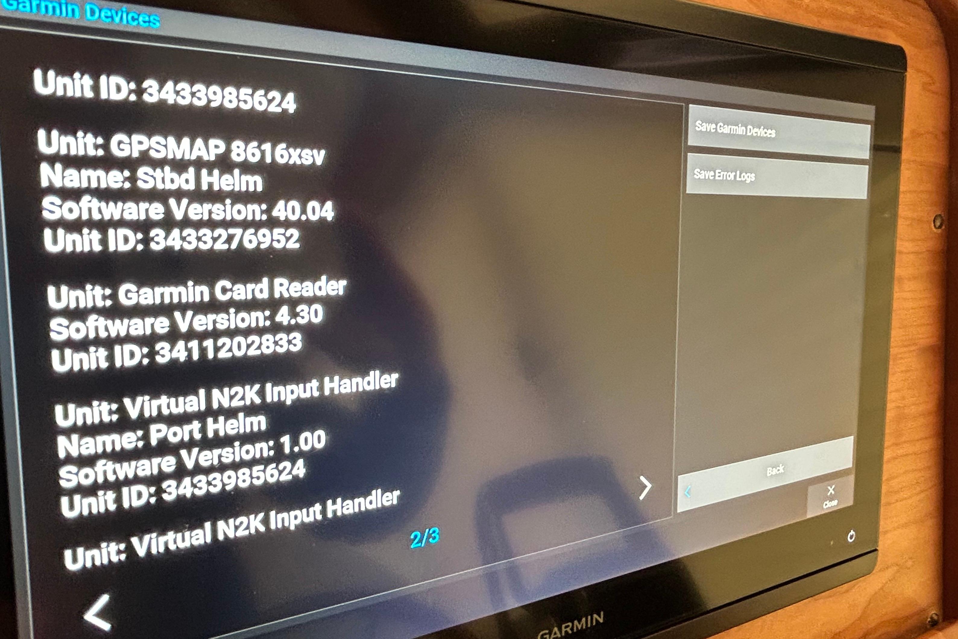 Garmin device screen displaying software versions and IDs