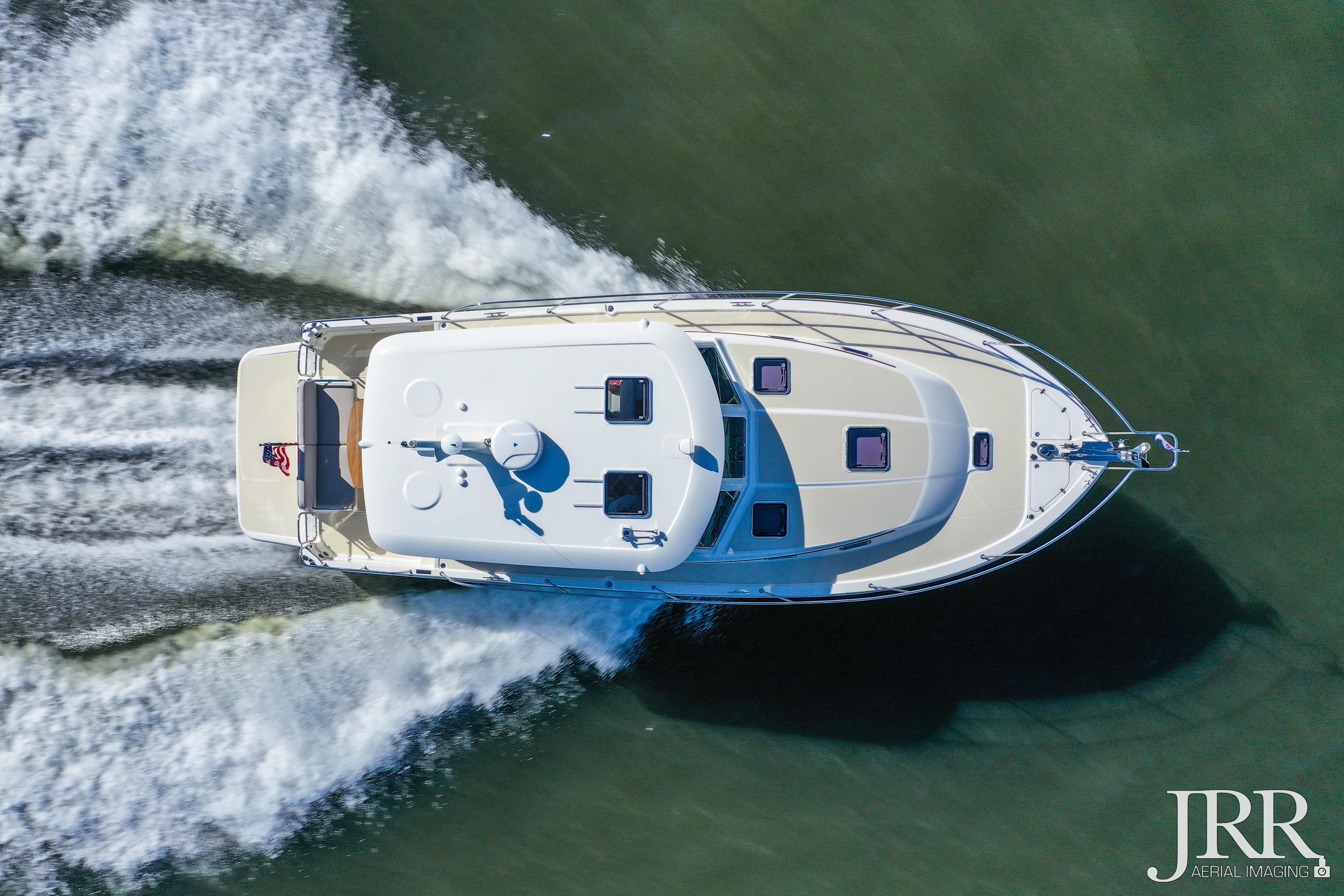 Aerial view of 2019 Sabre 38 Salon Express cruising on water.