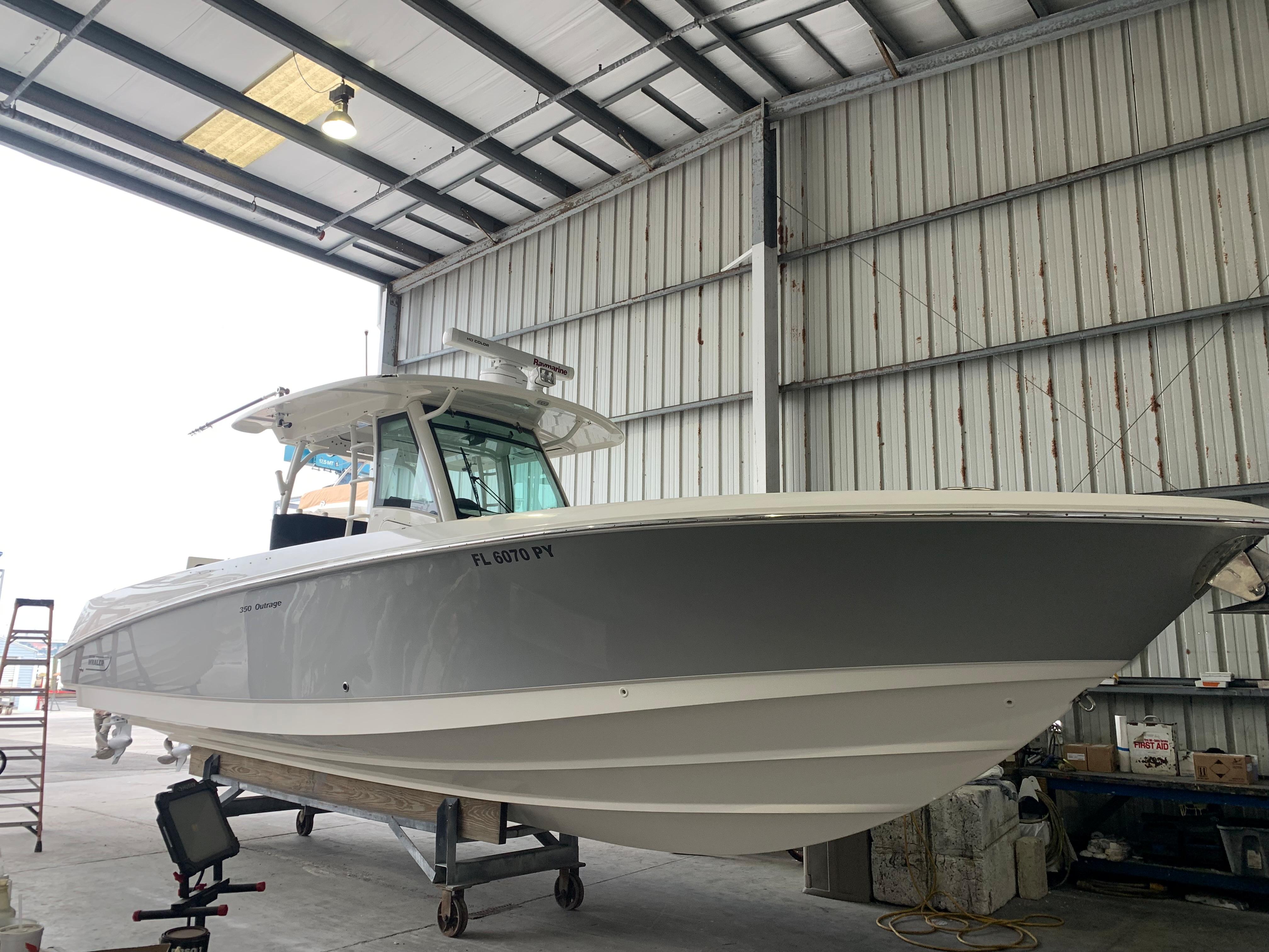 Boston Whaler 350 Outrage Halfdot-Profile, On Stand in Dry Storage