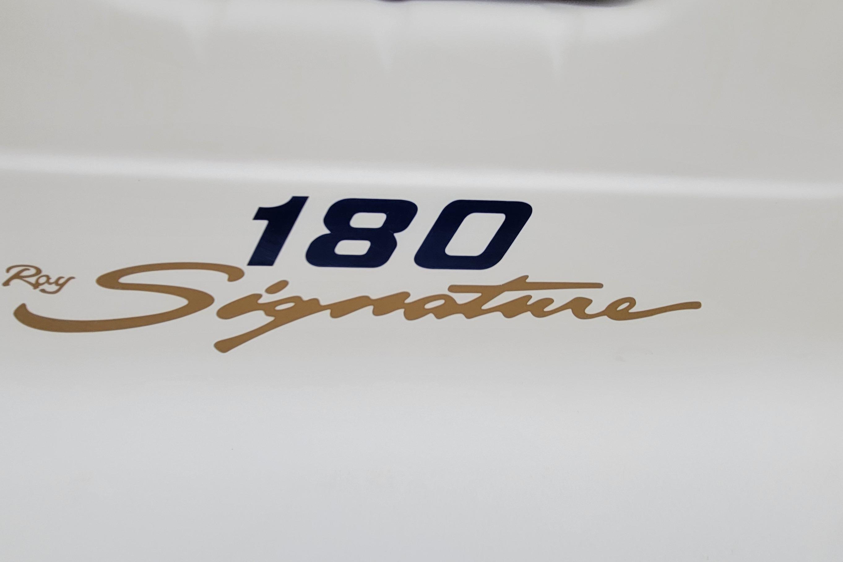 1994 Sea Ray 180 Bow Rider Signature logo on boat hull.