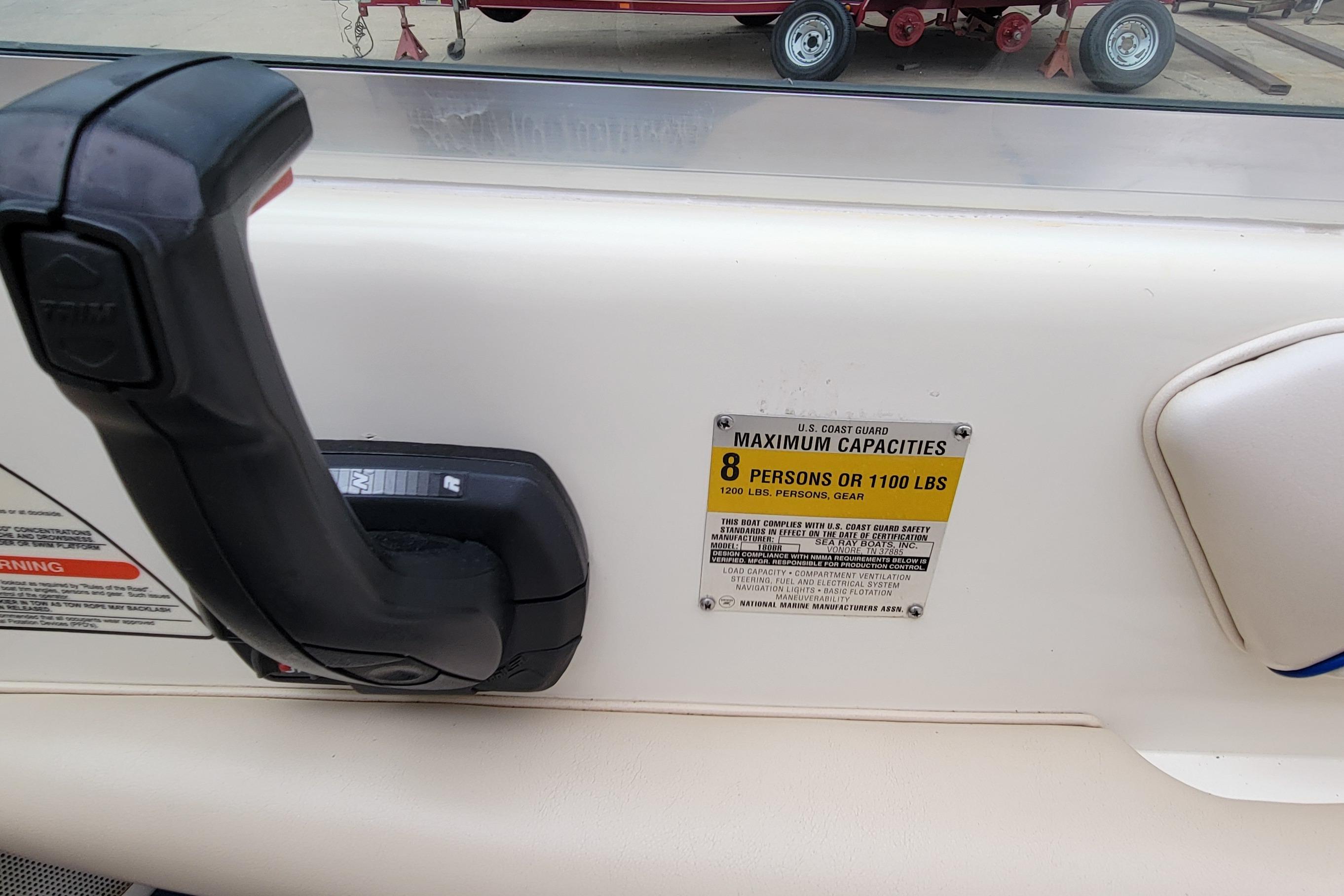 1994 Sea Ray 180 Bow Rider capacity label, showing maximum of 8 persons or 1100 lbs.