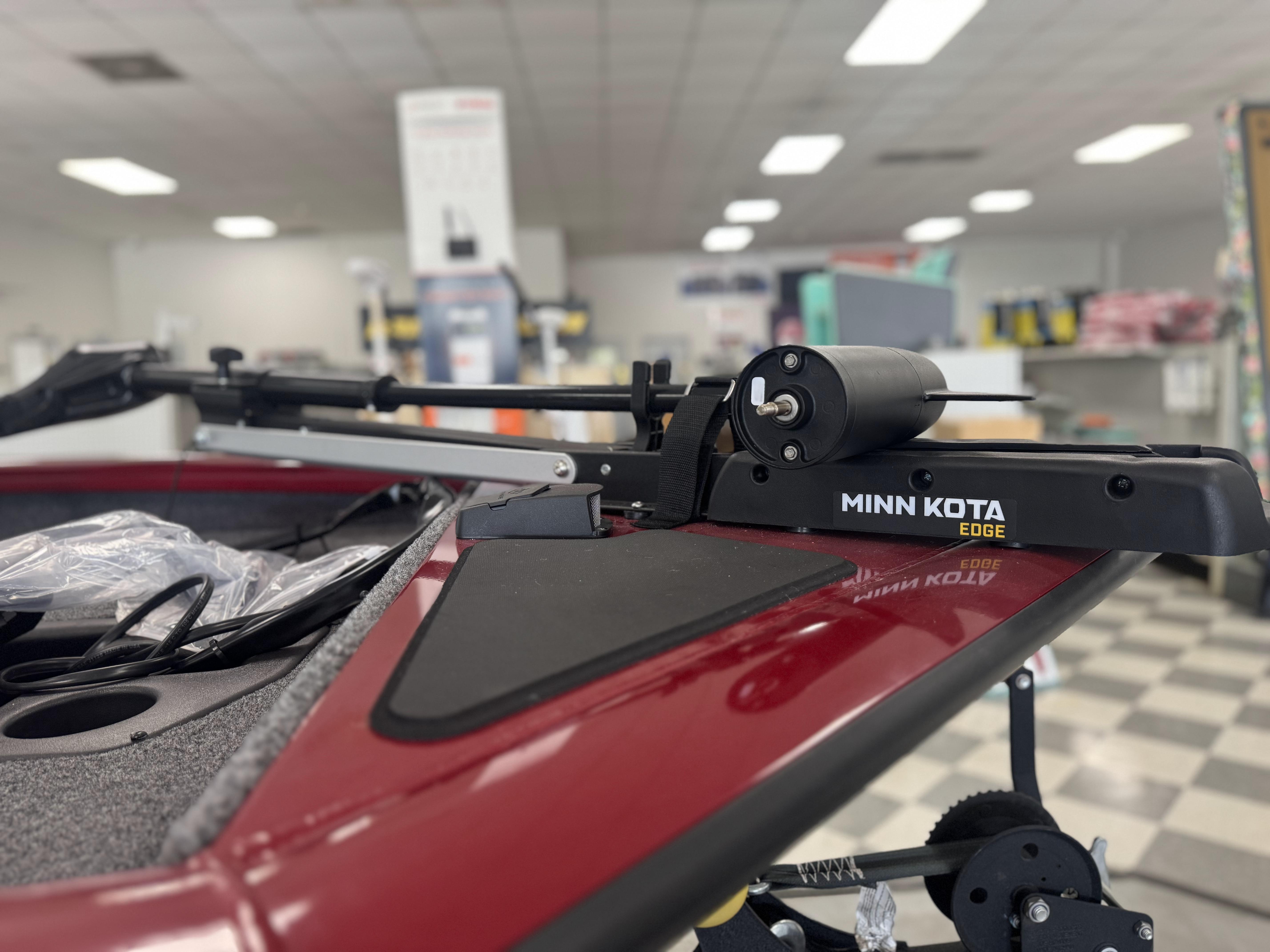2025 Tracker Pro Team 175 with Minn Kota Edge trolling motor in showroom.