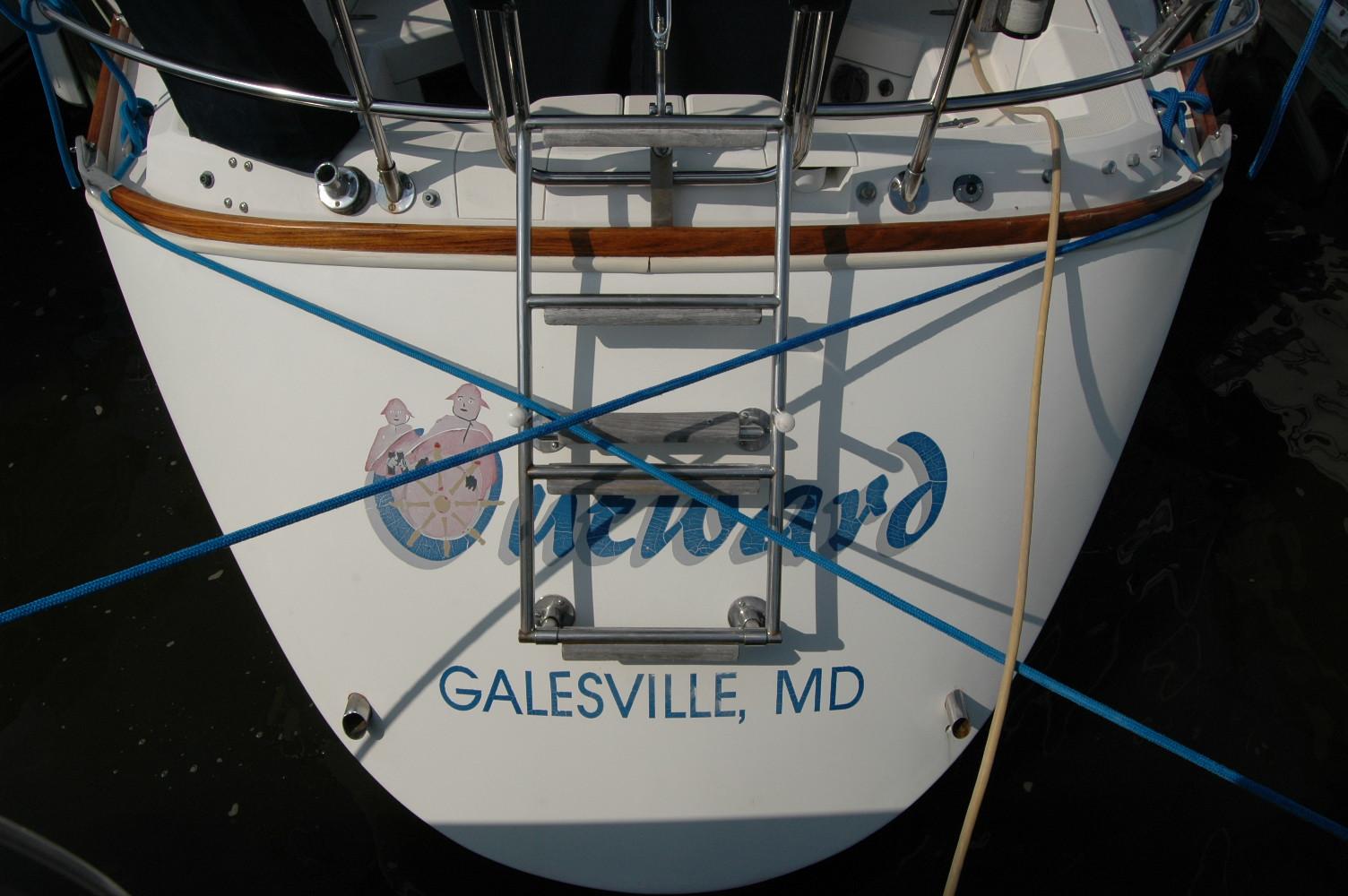 1988 Sabre 38 MkII sailboat stern with ladder, docked in Galesville, MD.