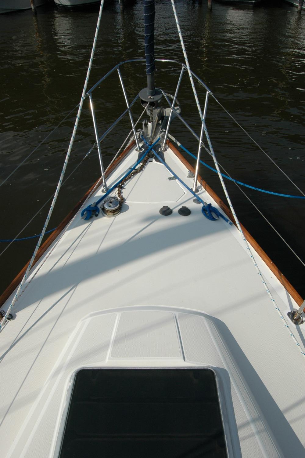 Bow of 1988 Sabre 38 MkII sailboat with rigging and ropes.