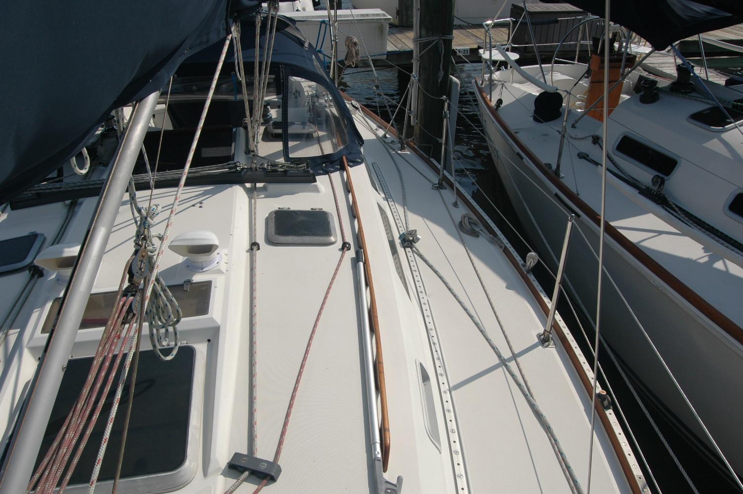 1988 Sabre 38 MkII sailboat docked, showcasing deck and rigging details.