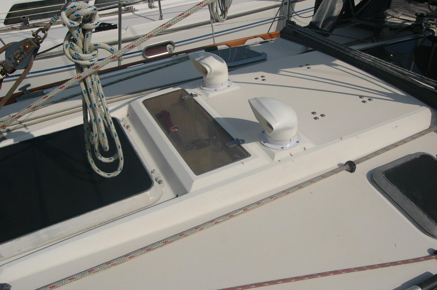 1988 Sabre 38 MkII yacht deck with ropes and ventilation hatches.