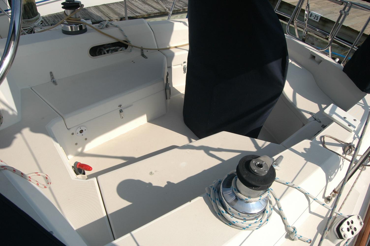 Cockpit of 1988 Sabre 38 MkII sailboat with winch and seating area.
