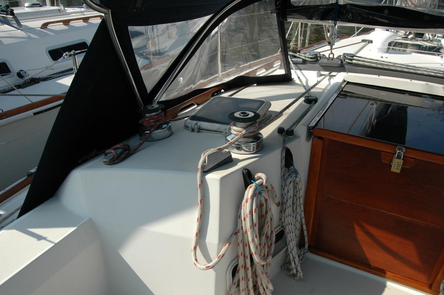 Cockpit of 1988 Sabre 38 MkII sailboat with ropes and winch.