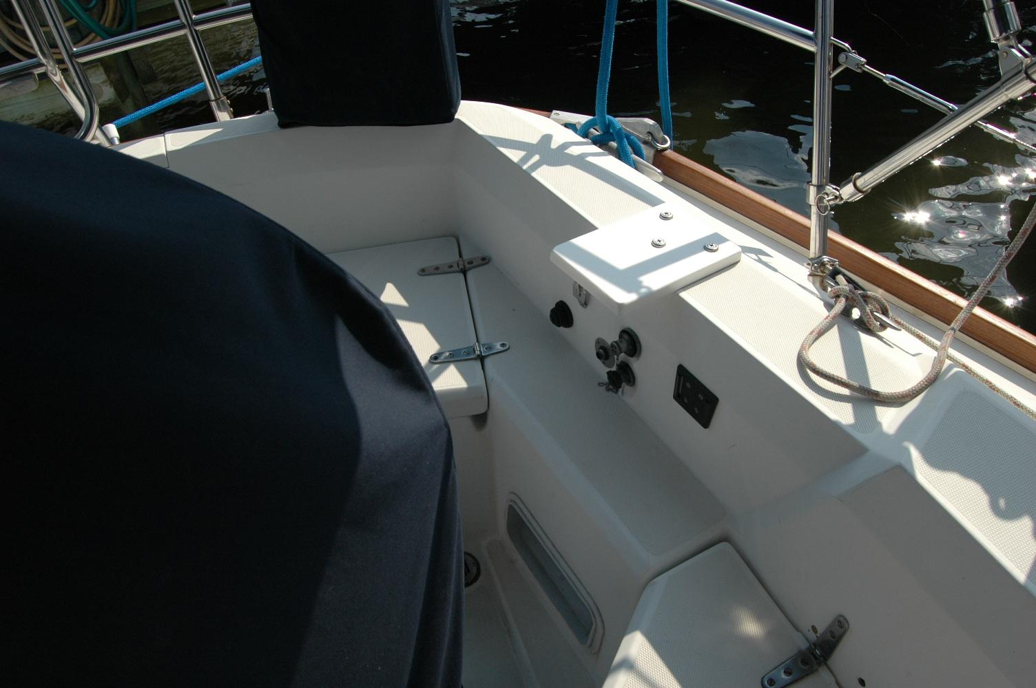Cockpit of 1988 Sabre 38 MkII sailboat with seating and control panel.