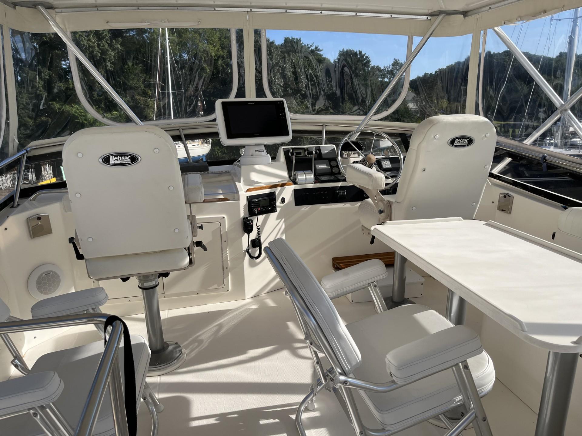 Sabre-Sabreline 47 1999-CANDY O RI-US-Interior of 1999 Sabreline 47 yacht with helm, seating, and navigation equipment.-9522318 | Thumbnail
