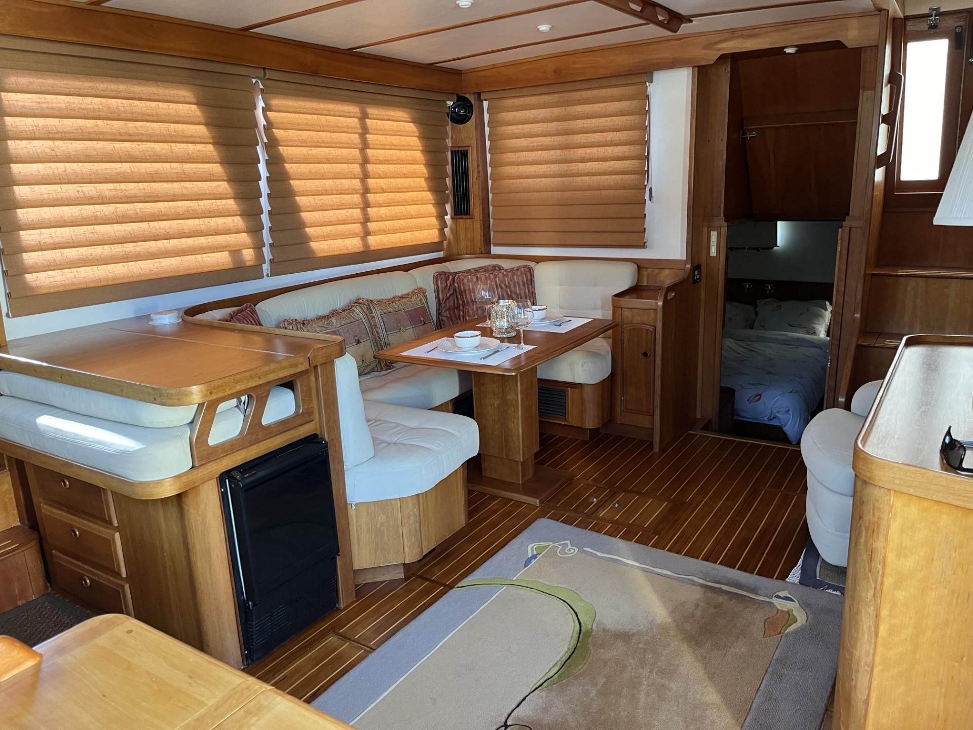 Sabre-Sabreline 47 1999-CANDY O RI-US-Interior of 1999 Sabre Sabreline 47 yacht with wood finish and cozy seating area.-9522318 | Thumbnail