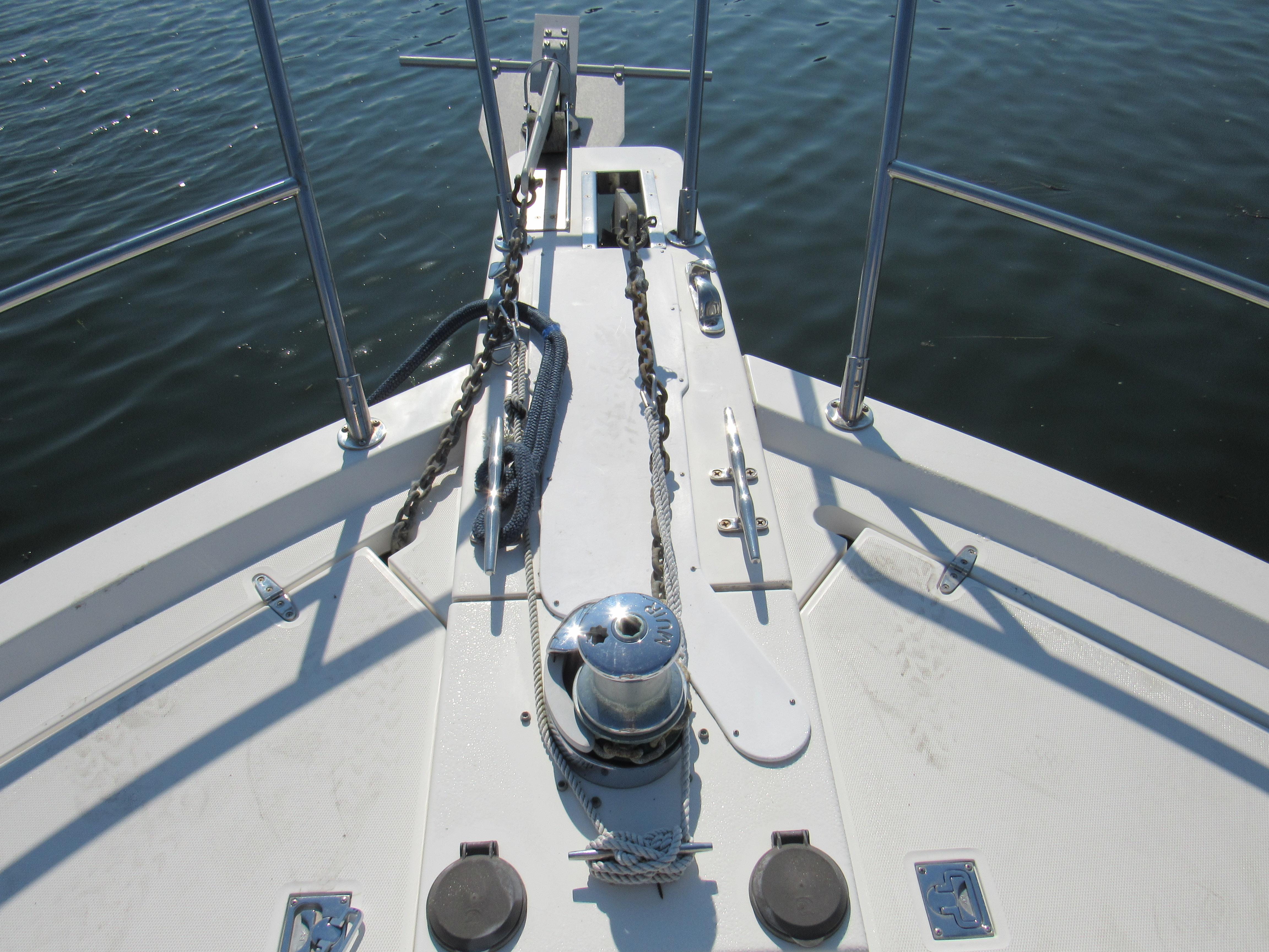 Sabre-Sabreline 47 1999-CANDY O RI-US-Bow of 1999 Sabreline 47 yacht with anchor chain and winch.-9522318 | Thumbnail