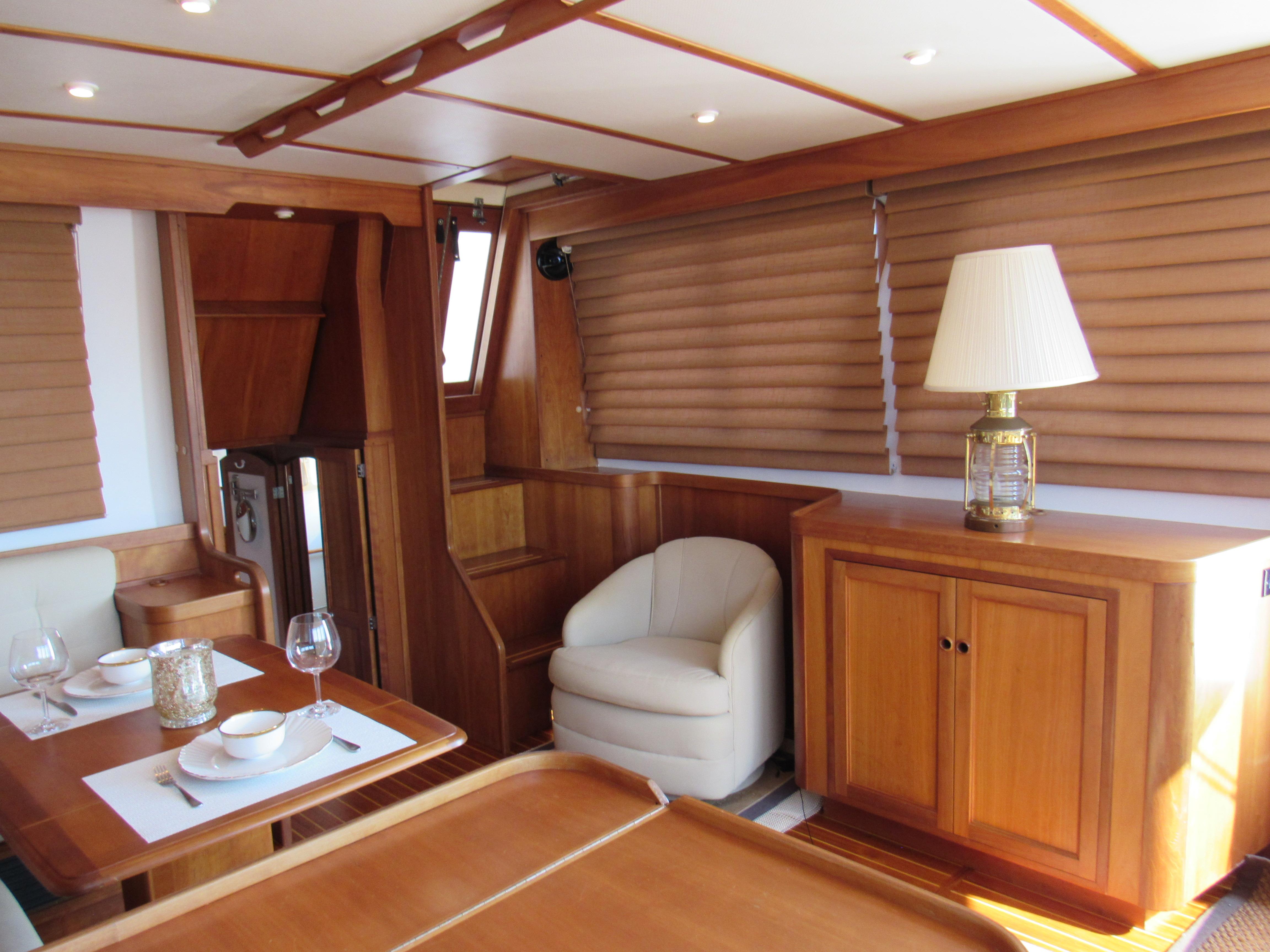 Sabre-Sabreline 47 1999-CANDY O RI-US-Interior of 1999 Sabre Sabreline 47 yacht with elegant wood finish and dining area.-9522318 | Thumbnail