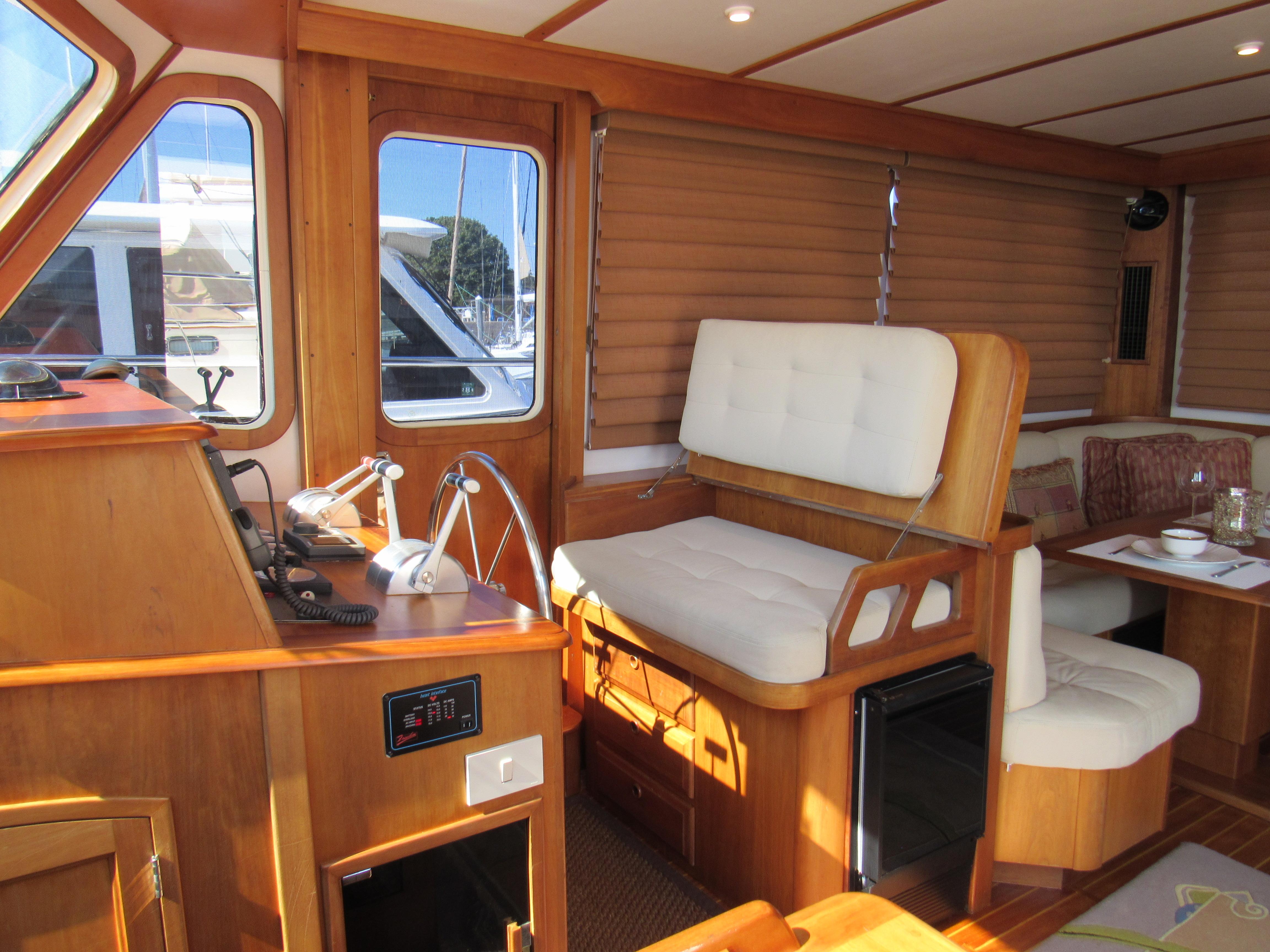 Sabre-Sabreline 47 1999-CANDY O RI-US-Interior of 1999 Sabreline 47 yacht with wooden finish and comfortable seating.-9522318 | Thumbnail