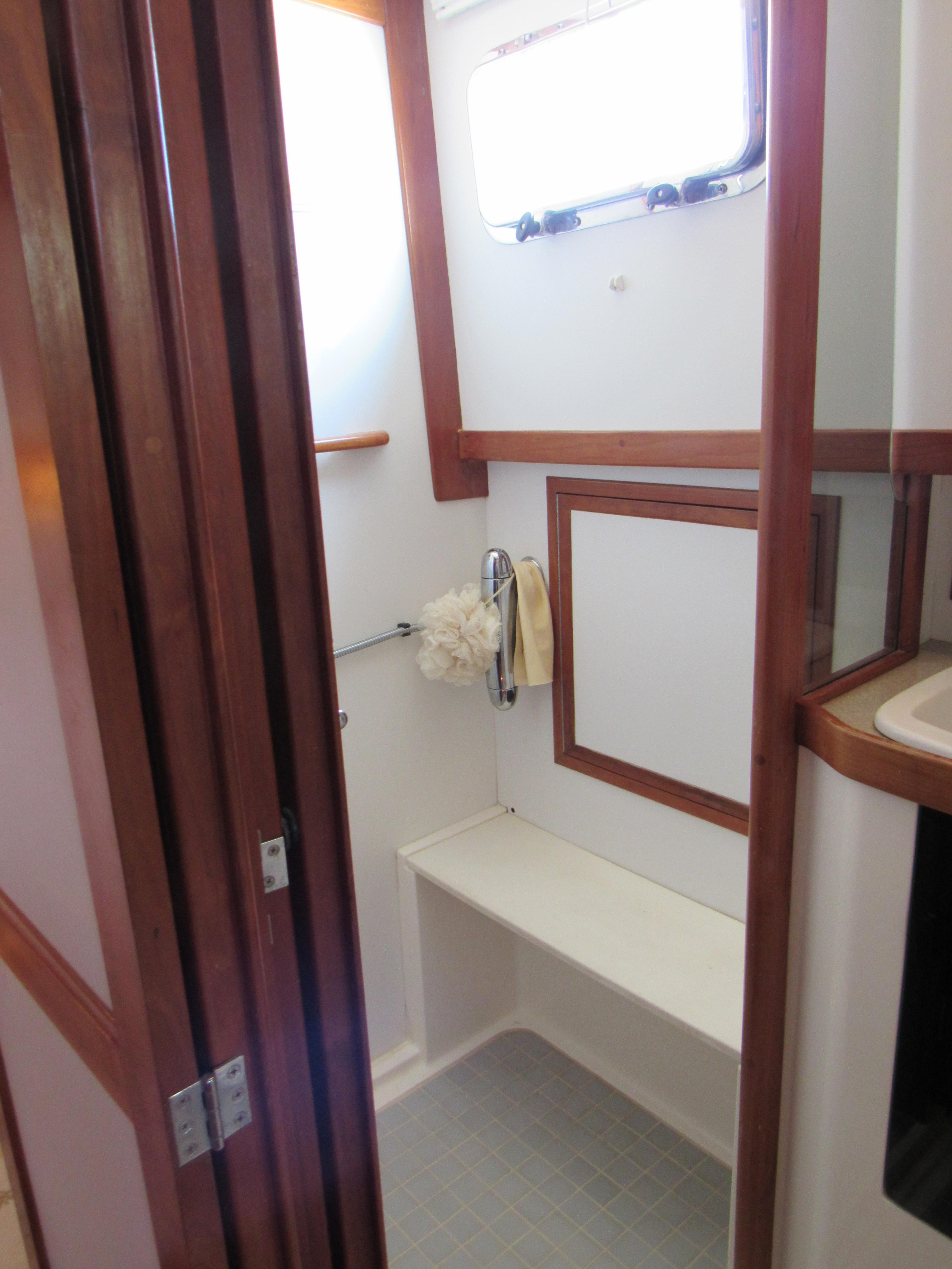 Sabre-Sabreline 47 1999-CANDY O RI-US-1999 Sabre Sabreline 47 yacht bathroom with wooden trim and window.-9522318 | Thumbnail