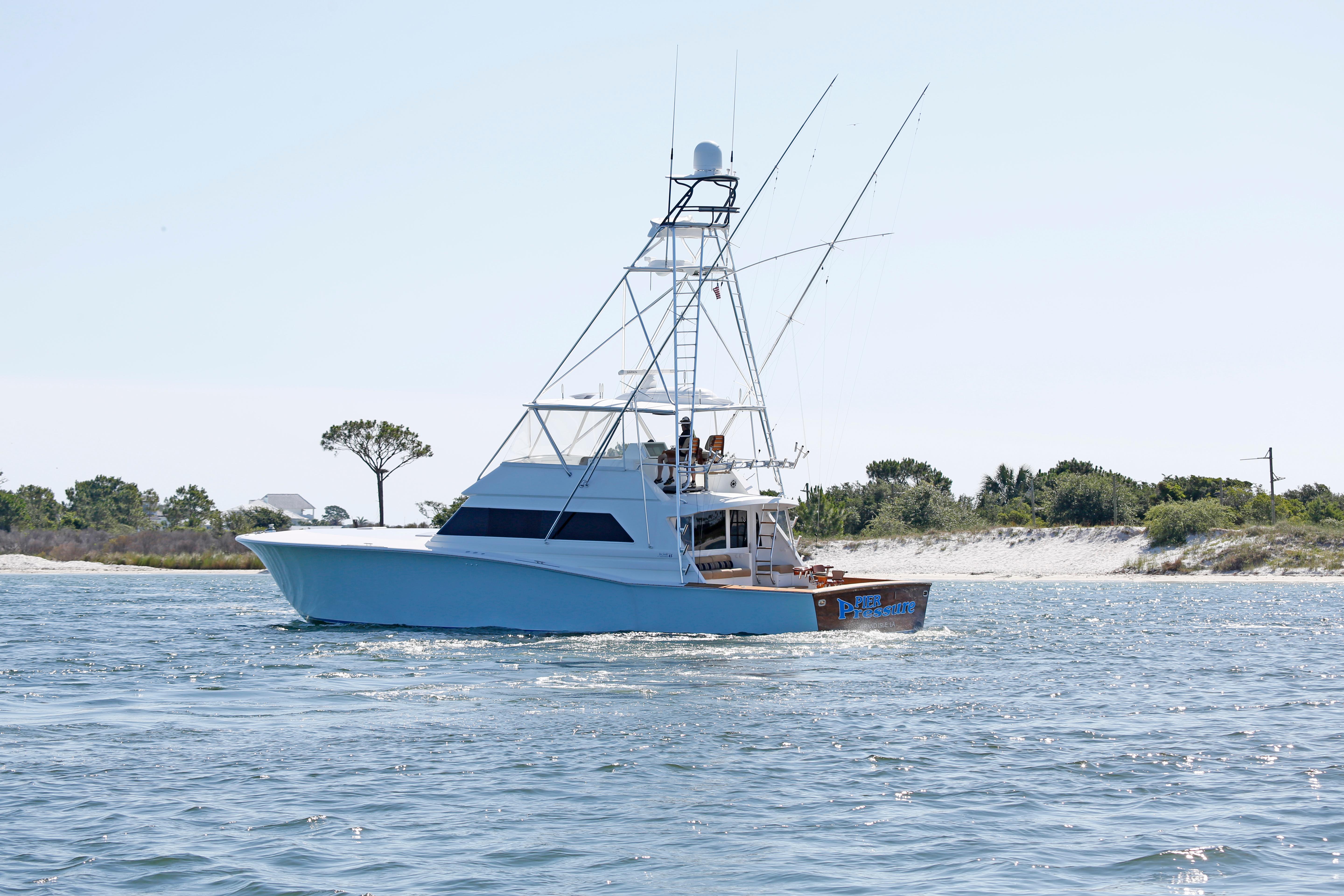 Jim Smith-65 Convertible 2000-PIER PRESSURE SC-US-Jim Smith 65 Convertible yacht cruising near a sandy shoreline, 2000 model.-9833594 | Thumbnail
