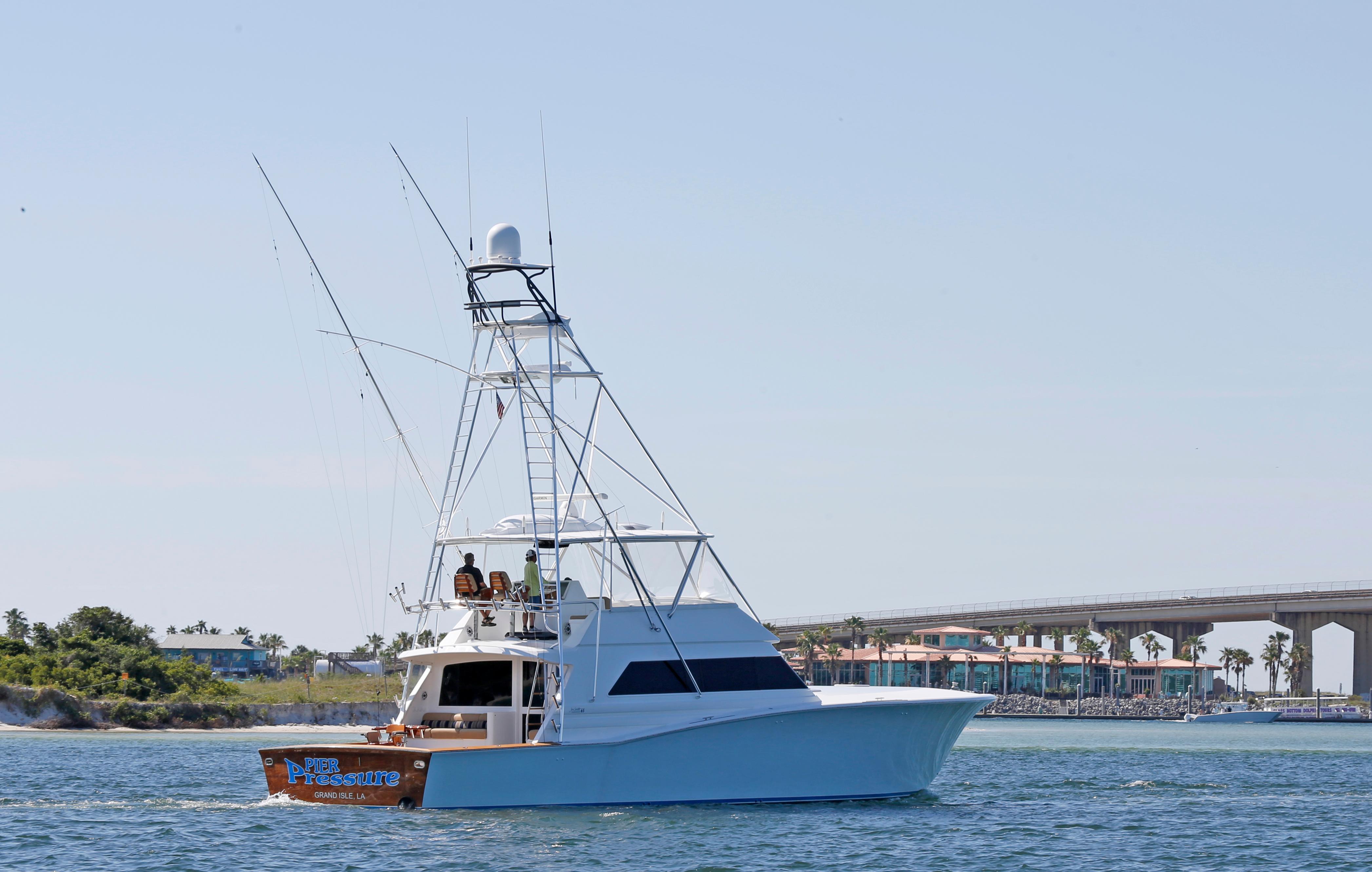 Jim Smith-65 Convertible 2000-PIER PRESSURE SC-US-Jim Smith 65 Convertible yacht cruising near a coastal bridge, 2000 model.-9833594