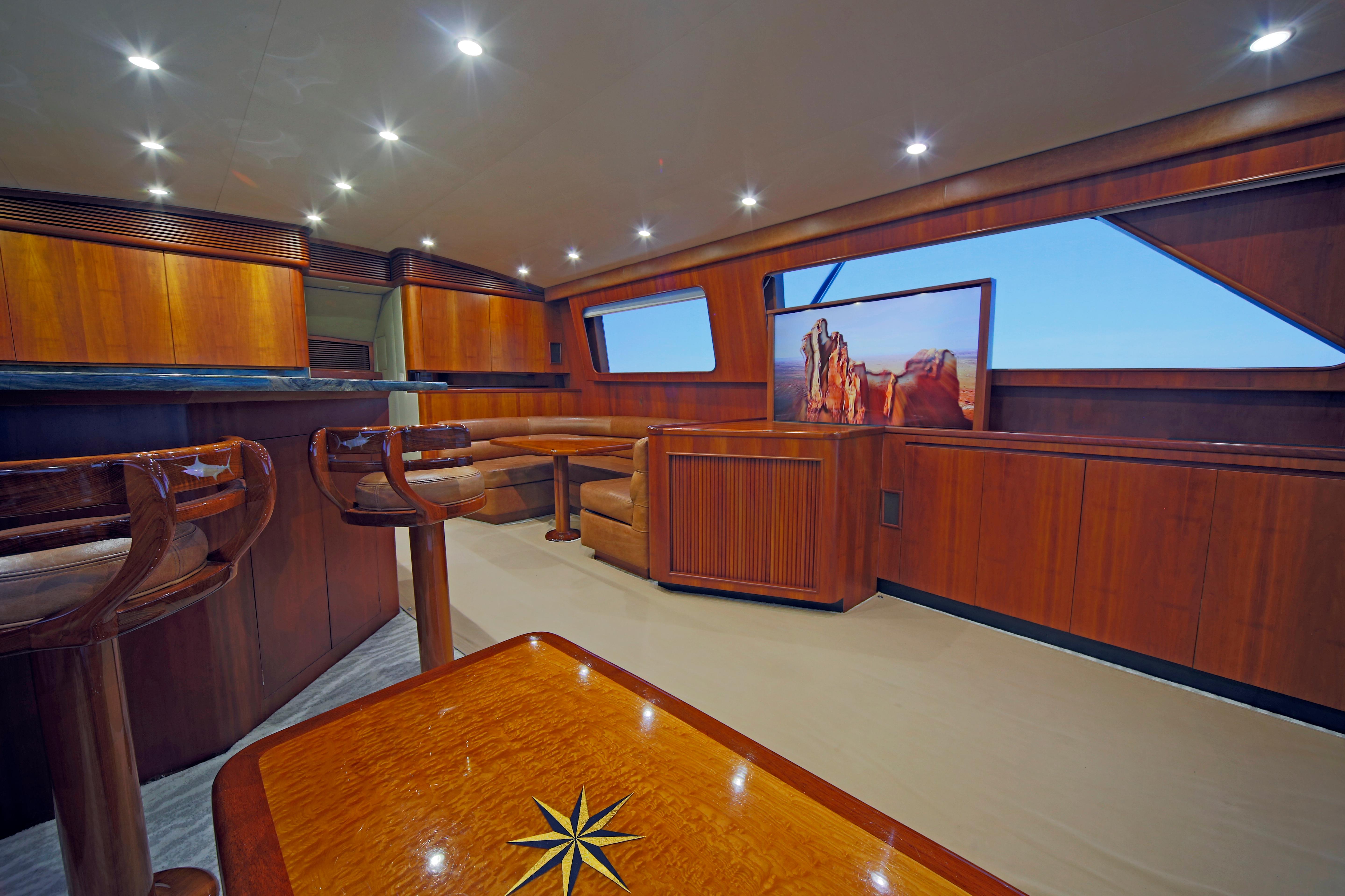 Jim Smith-65 Convertible 2000-PIER PRESSURE SC-US-Luxurious interior of a 2000 Jim Smith 65 Convertible yacht with elegant wood finishes.-9833594 | Thumbnail