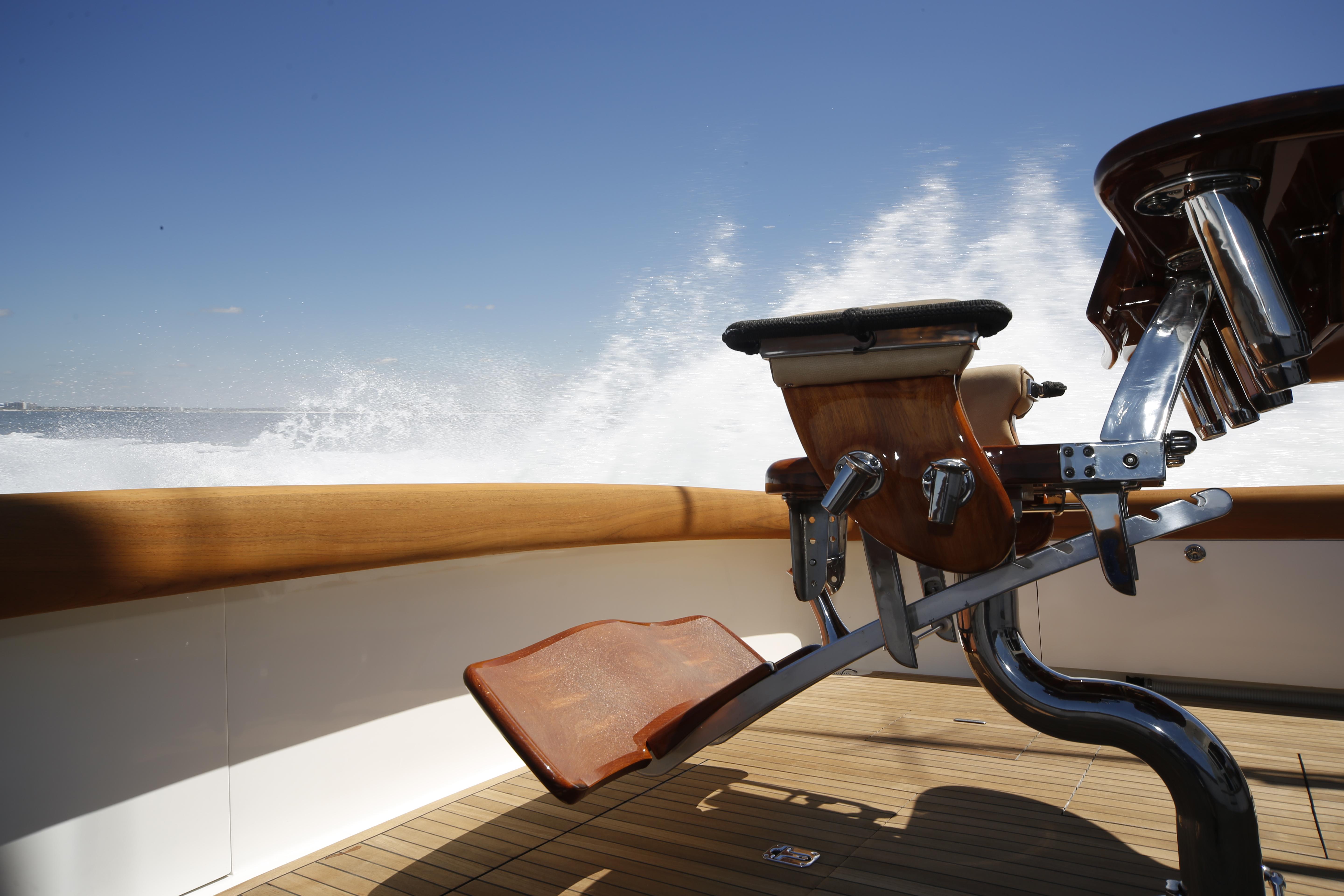 Jim Smith-65 Convertible 2000-PIER PRESSURE SC-US-Jim Smith 65 Convertible yacht, 2000 model, with fishing chair on deck, ocean backdrop.-9833594 | Thumbnail