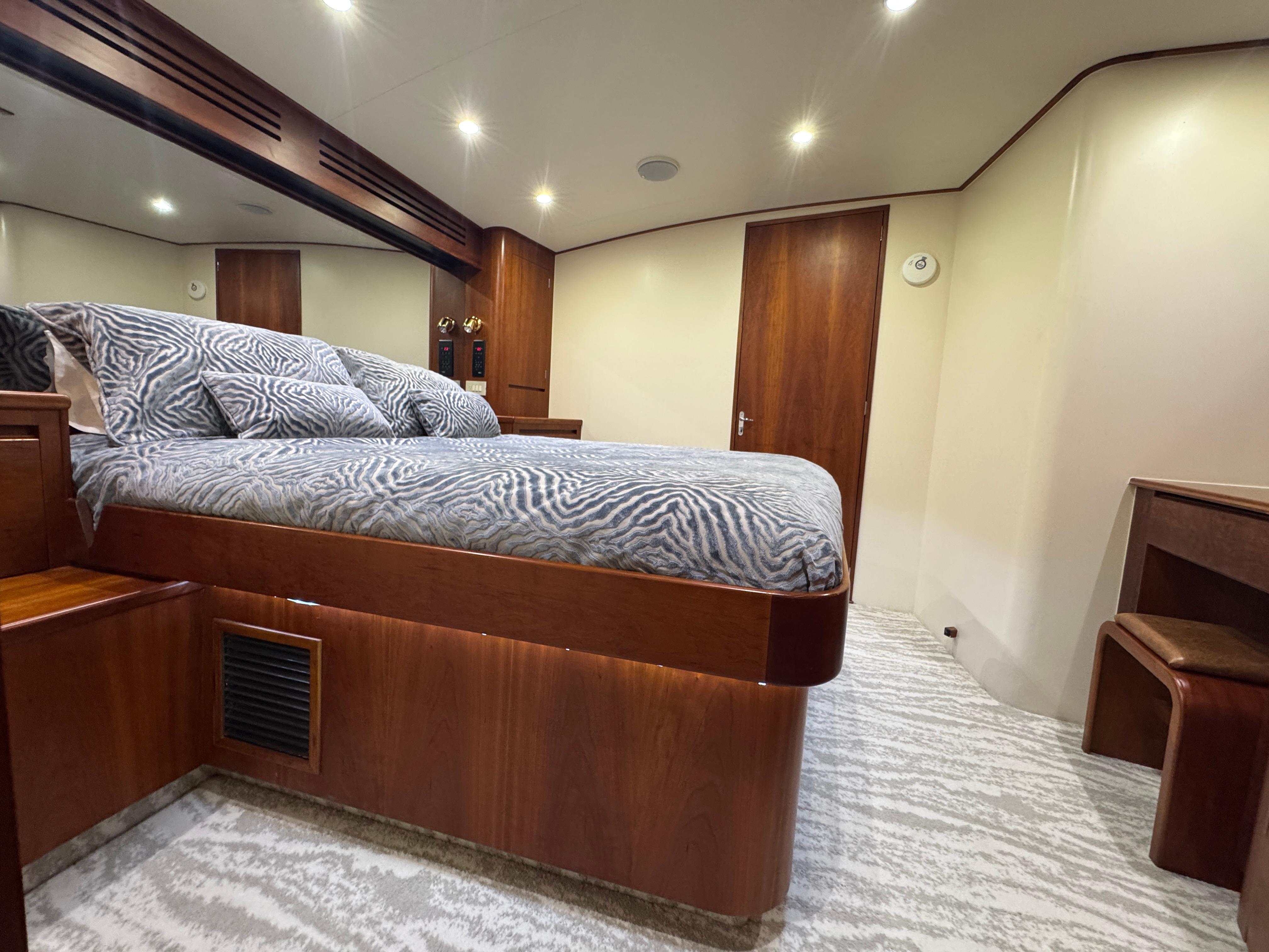 Jim Smith-65 Convertible 2000-PIER PRESSURE SC-US-Luxurious bedroom interior of 2000 Jim Smith 65 Convertible yacht with elegant wood finishes.-9833594 | Thumbnail