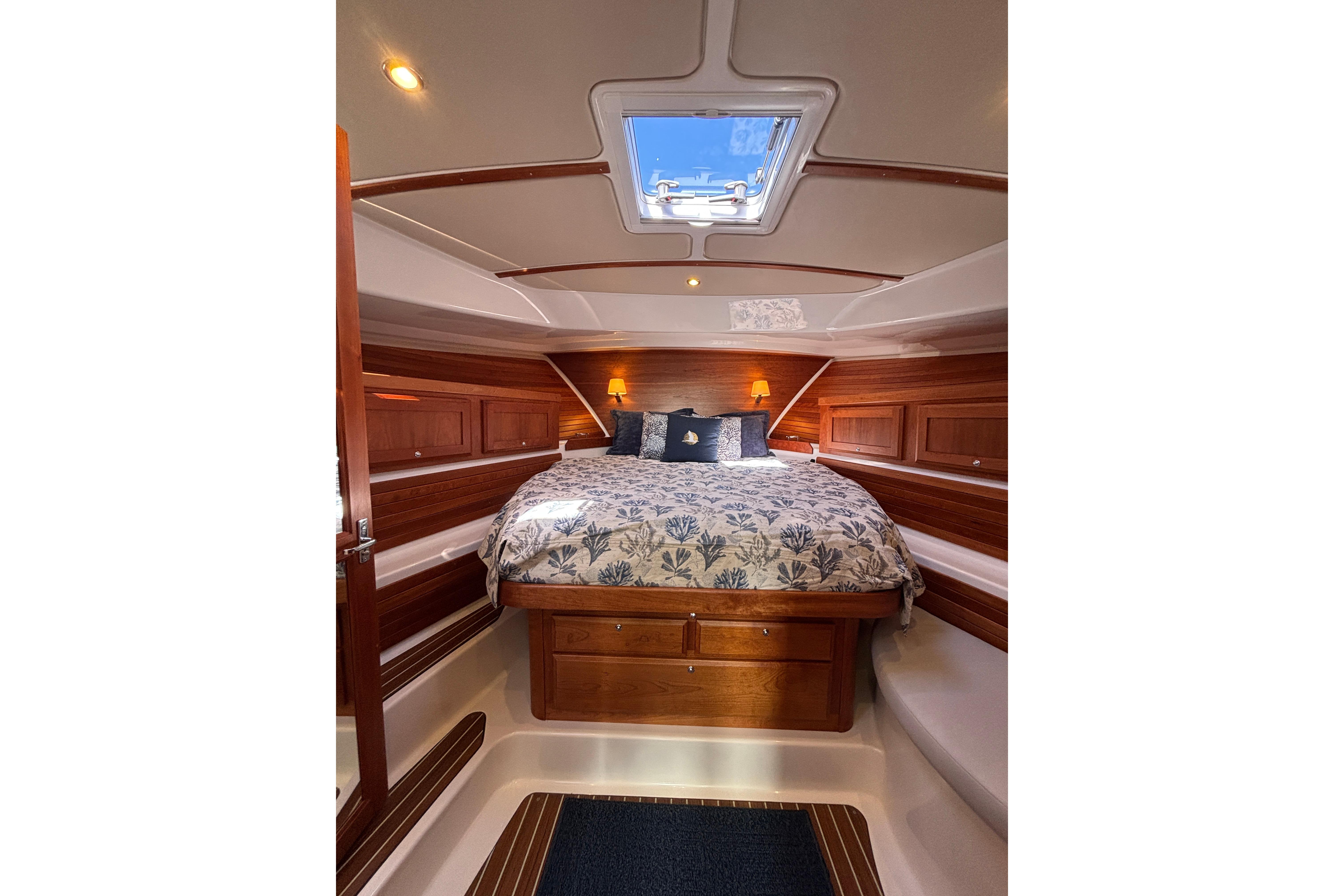 Luxurious cabin interior of 2020 Back Cove 37 yacht with elegant wood finish.