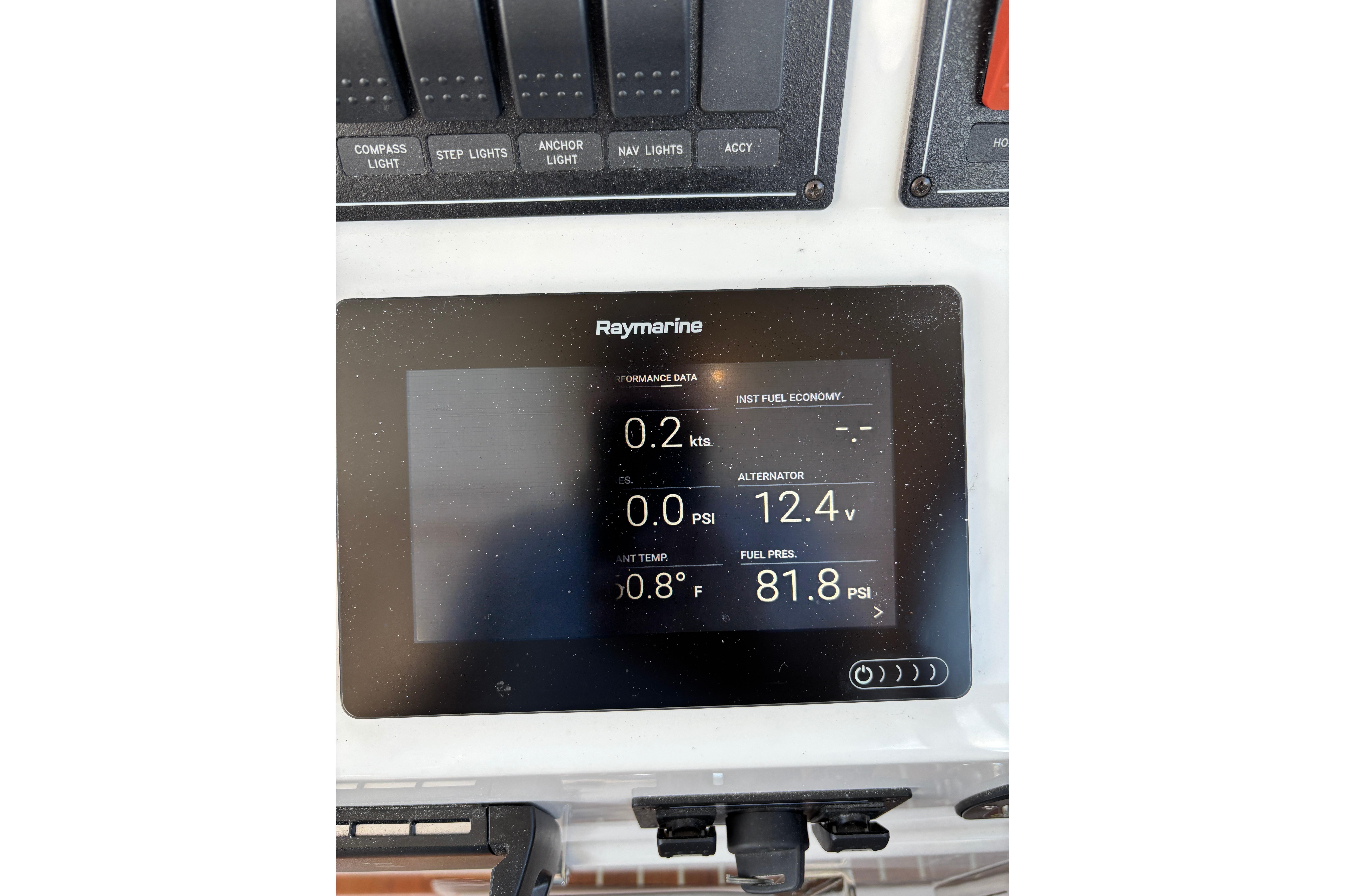 Raymarine display on 2020 Back Cove 37 showing performance data and fuel pressure.