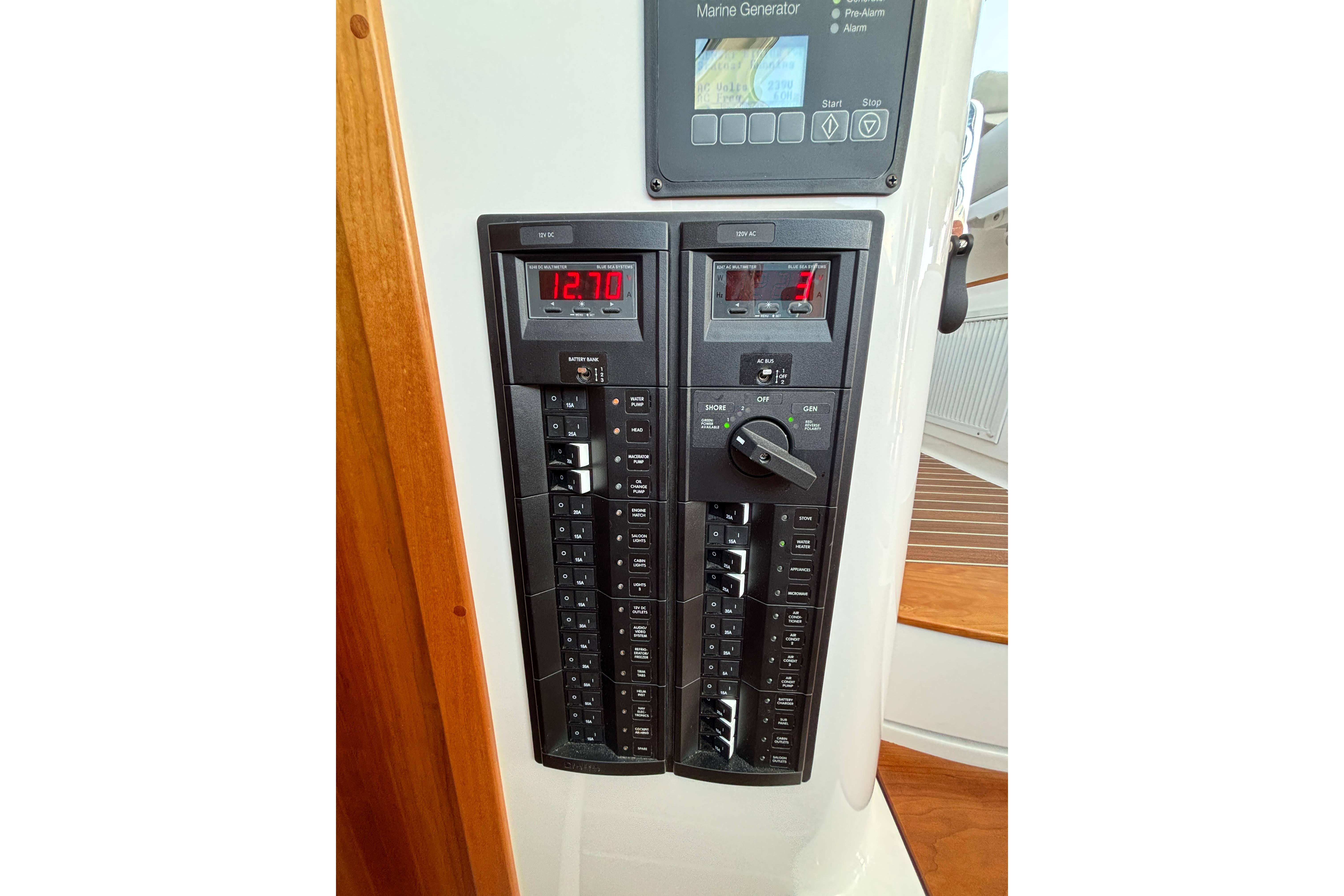 Control panel of a 2020 Back Cove 37 boat, featuring digital displays and switches.
