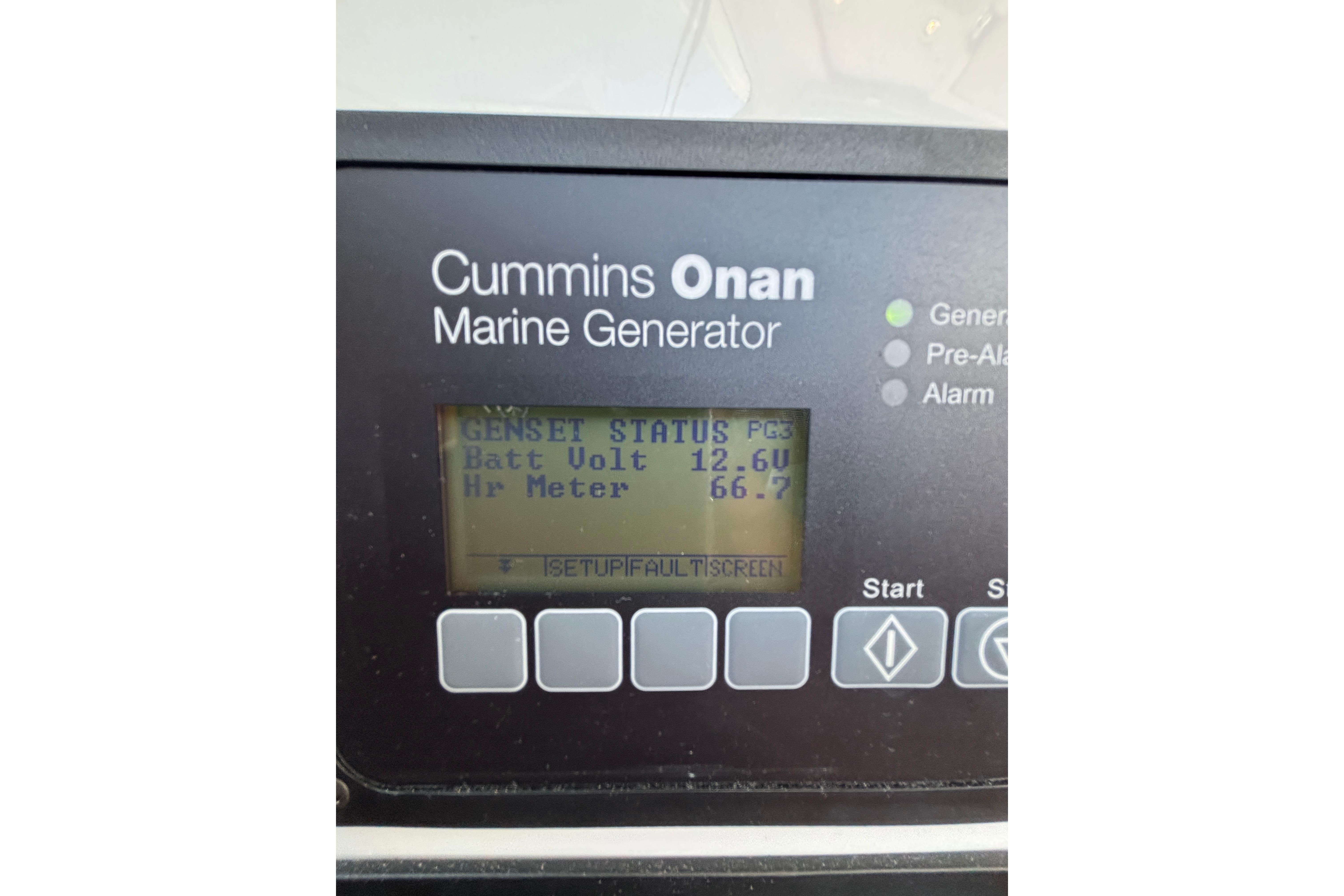 Cummins Onan marine generator display on 2020 Back Cove 37 boat, showing battery voltage.
