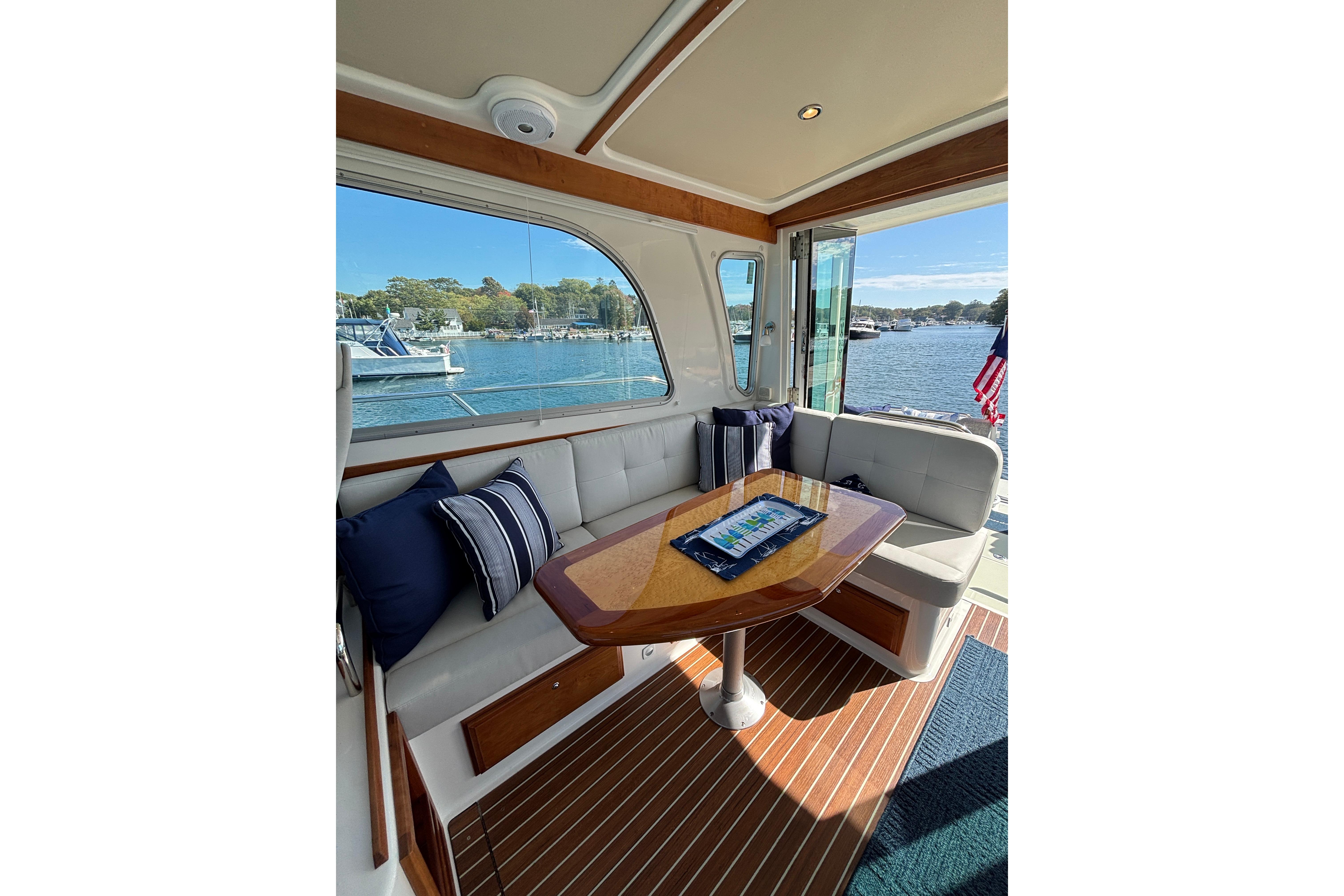 Luxurious interior of 2020 Back Cove 37 yacht with waterfront view.