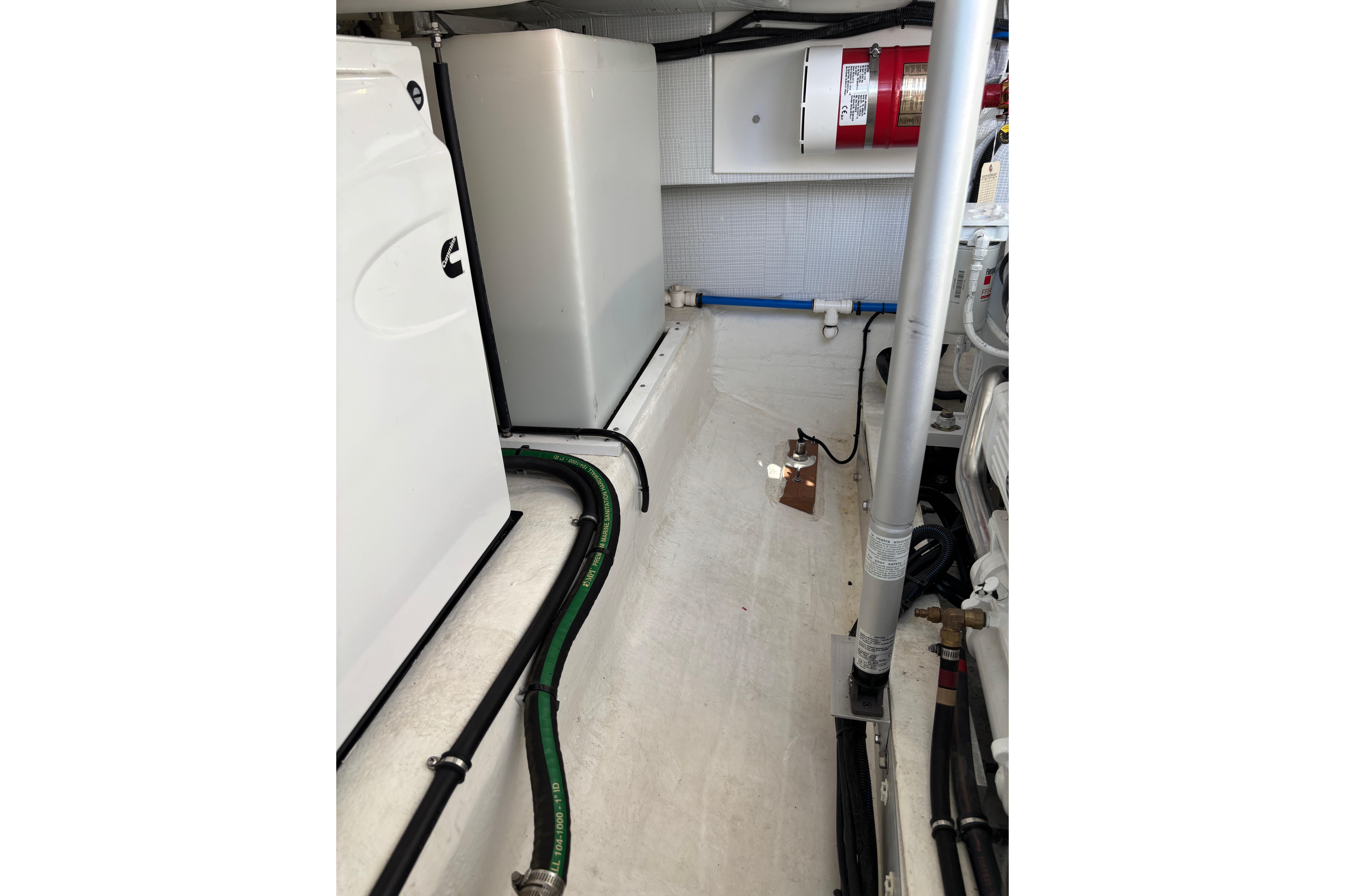 Engine room of 2020 Back Cove 37 boat, featuring equipment and wiring.