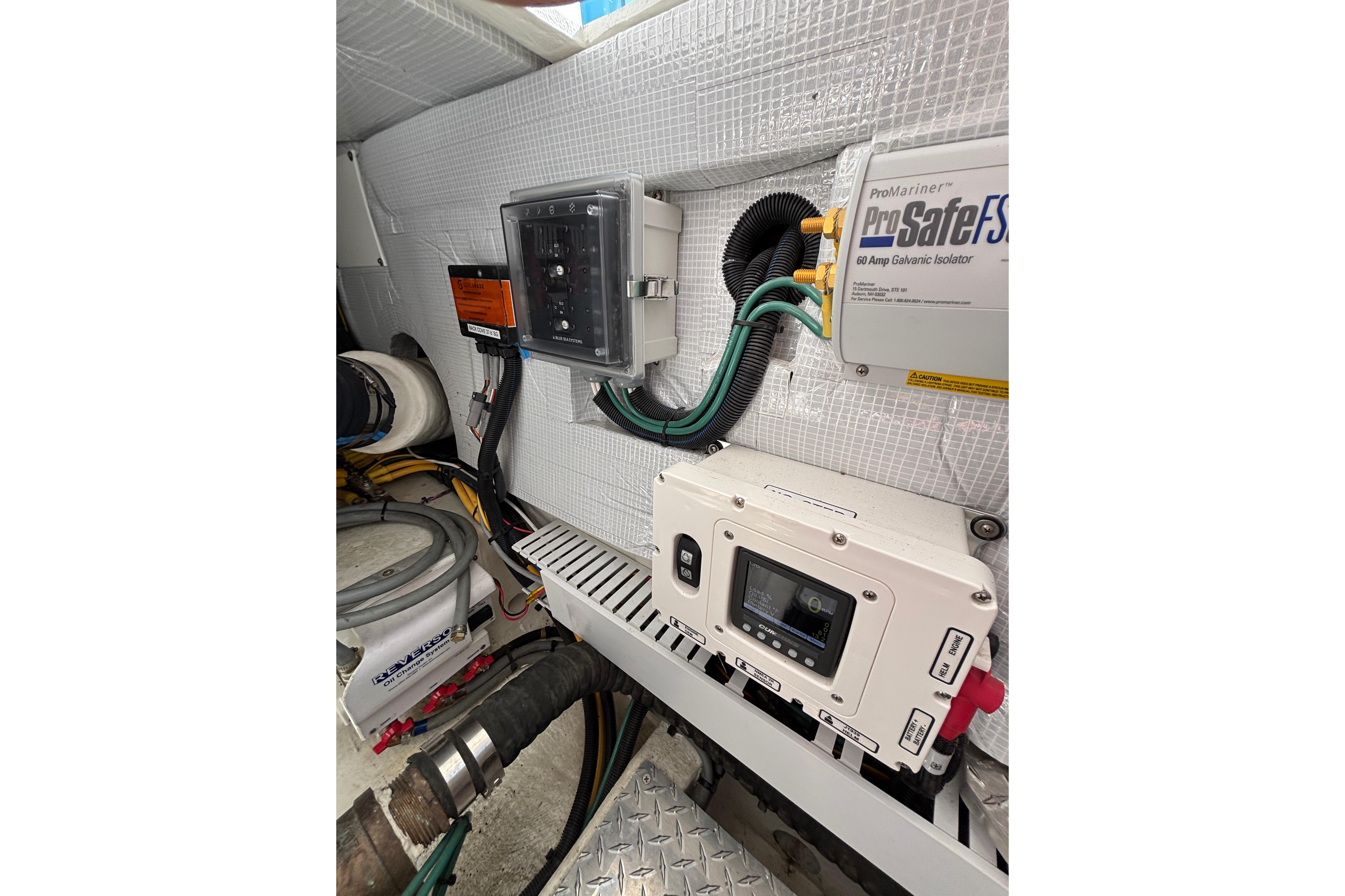 Engine room of 2020 Back Cove 37 with electrical components and wiring.