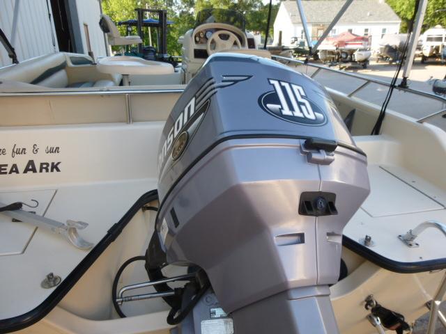 SeaArk Sunstar 21 boat with Johnson 115 outboard motor, 2000 model.