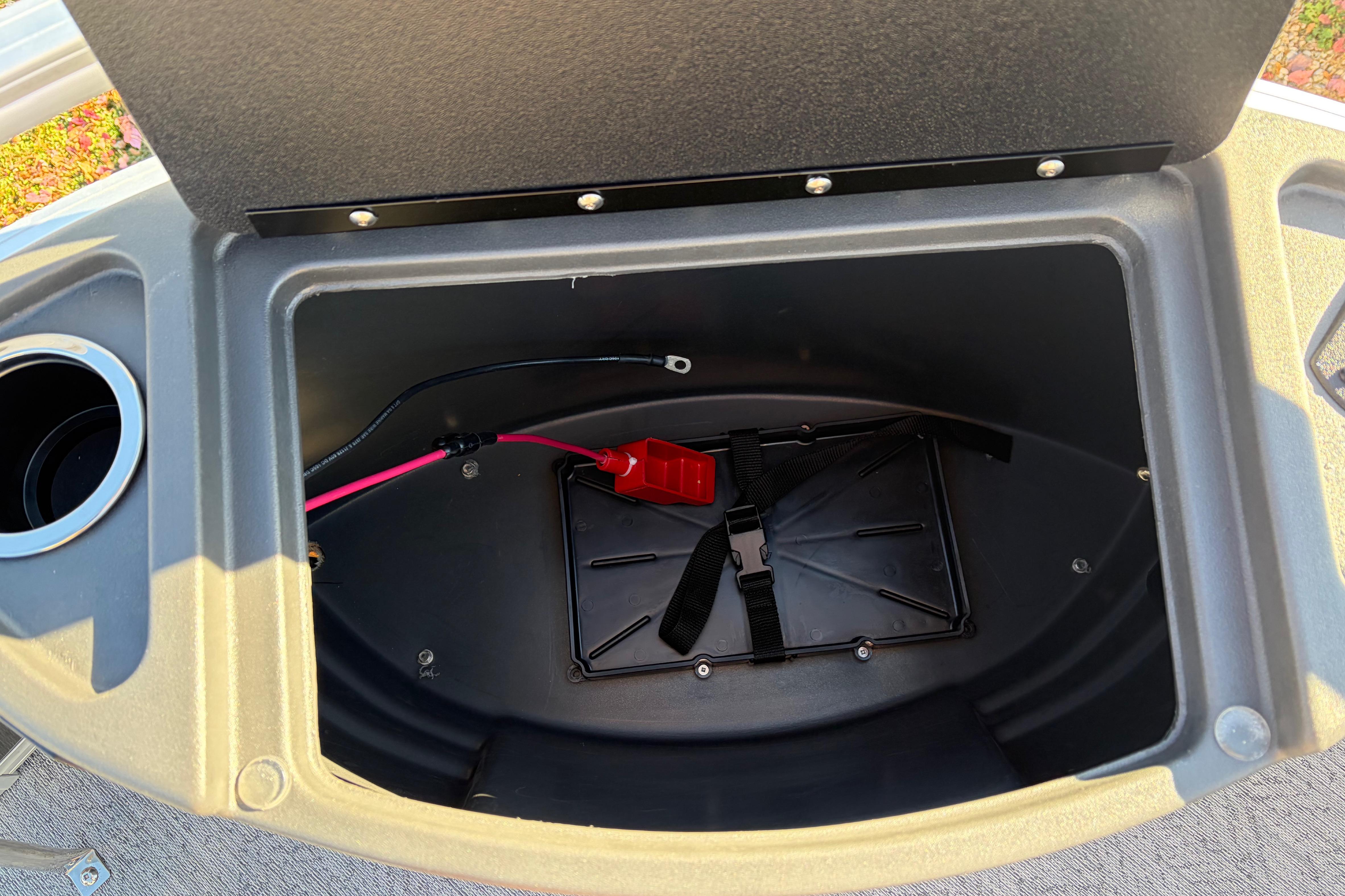 Open storage compartment in 2026 Sun Tracker Bass Buggy 18 DLX boat.