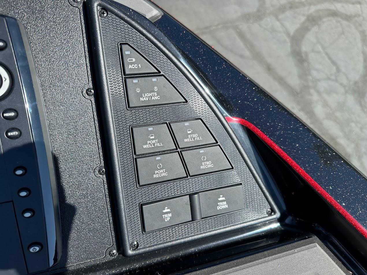 Control panel of 2024 Caymas XS 20 boat with various function buttons.