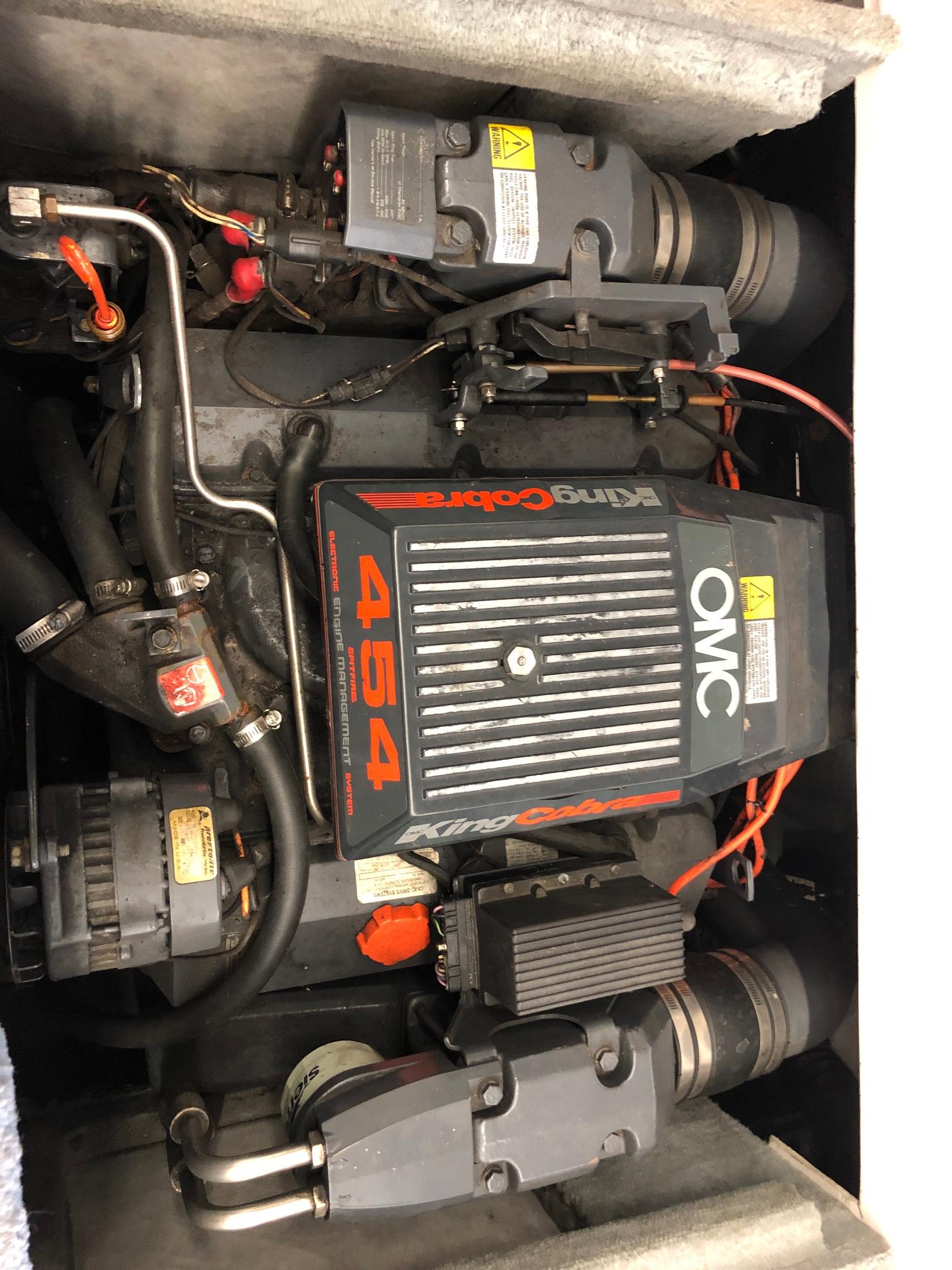 1992 Four Winns 220 Horizon Open Bow boat engine compartment with OMC King Cobra 454 engine.