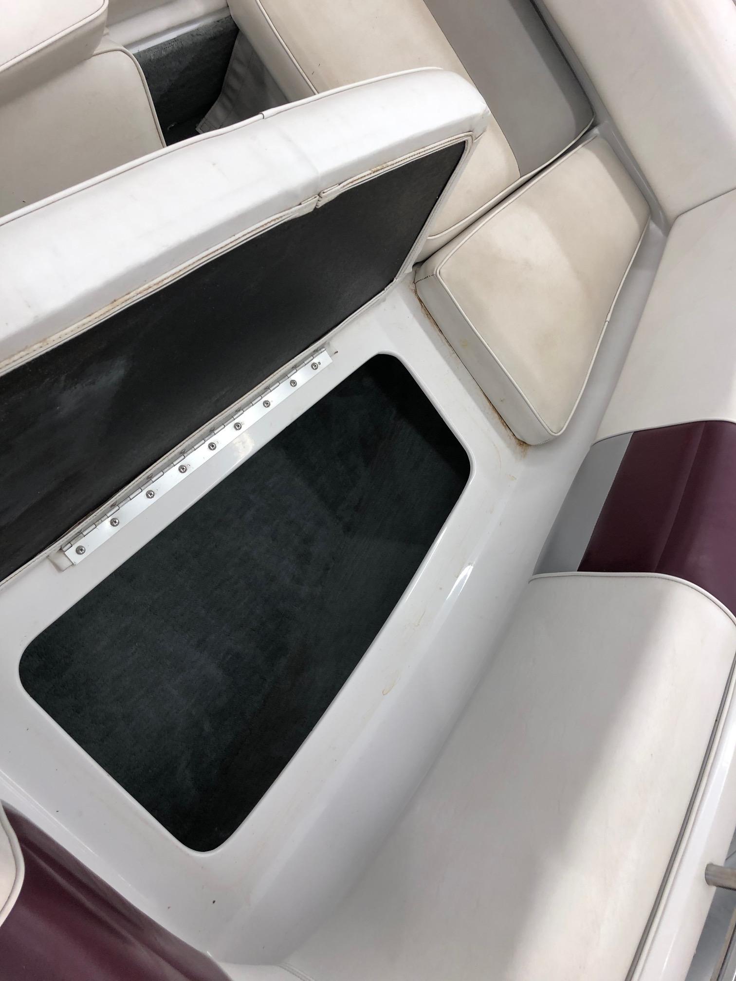 1992 Four Winns 220 Horizon Open Bow boat interior storage compartment.