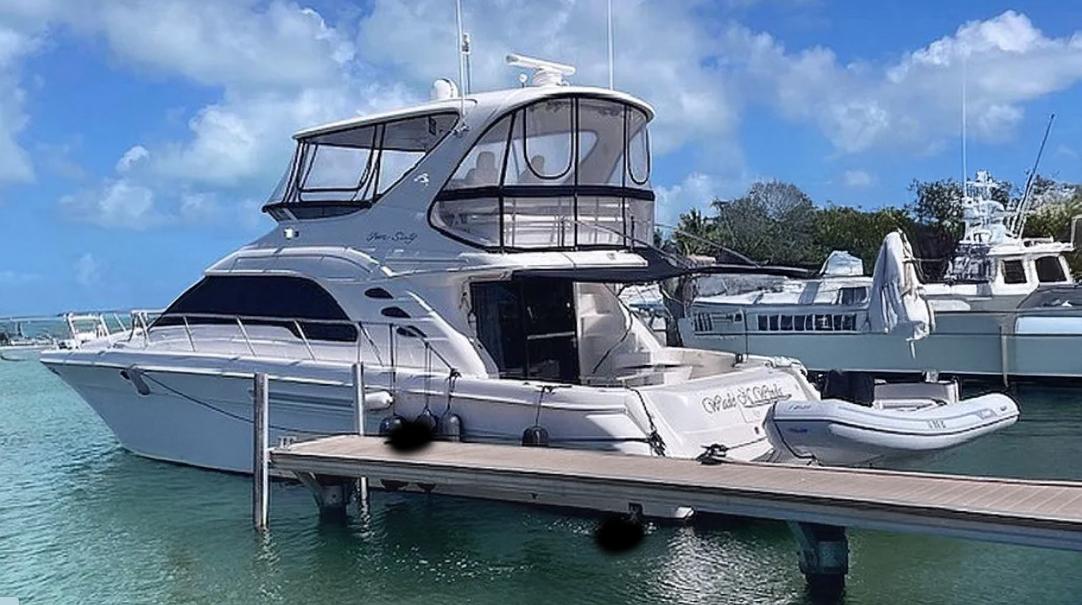Sea Ray-560 Sedan Bridge 1999-Wade N Winda FL-US-1999 Sea Ray 560 Sedan Bridge yacht docked in a marina under blue skies.-9842472