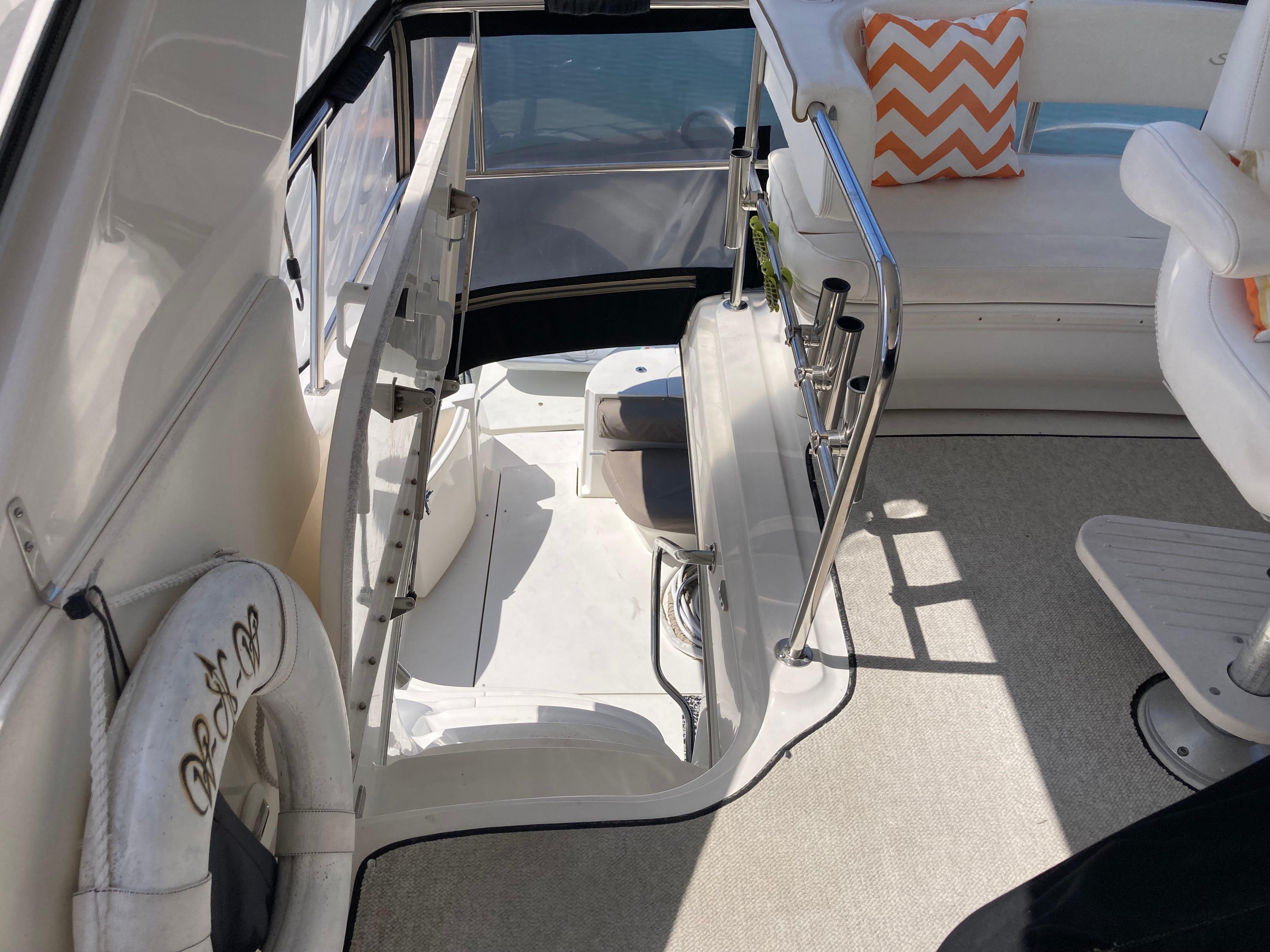 Sea Ray-560 Sedan Bridge 1999-Wade N Winda FL-US-1999 Sea Ray 560 Sedan Bridge interior with seating and nautical decor.-9842472 | Thumbnail