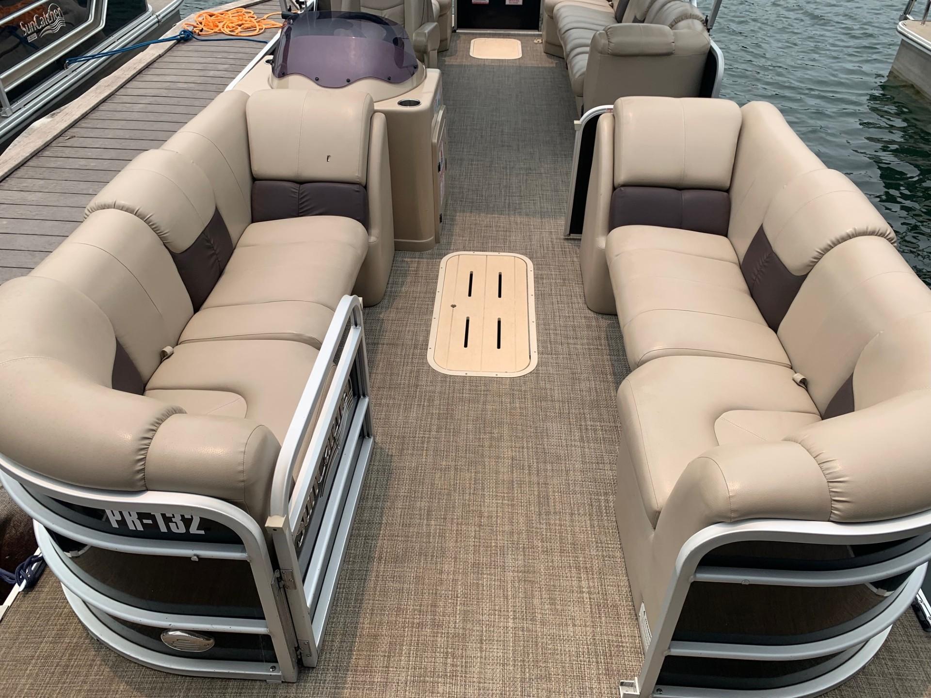 2021 G3 SunCatcher Fusion 325RCX pontoon boat with spacious seating and modern design.