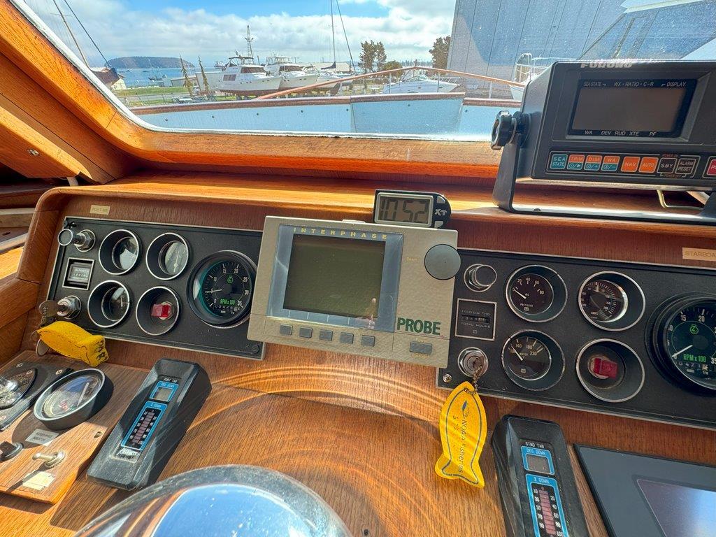 Ocean Alexander-50 MK1 1980 -WA-US-Control panel of a 1980 Ocean Alexander 50 MK1 yacht with various gauges and displays.-9725618 | Thumbnail