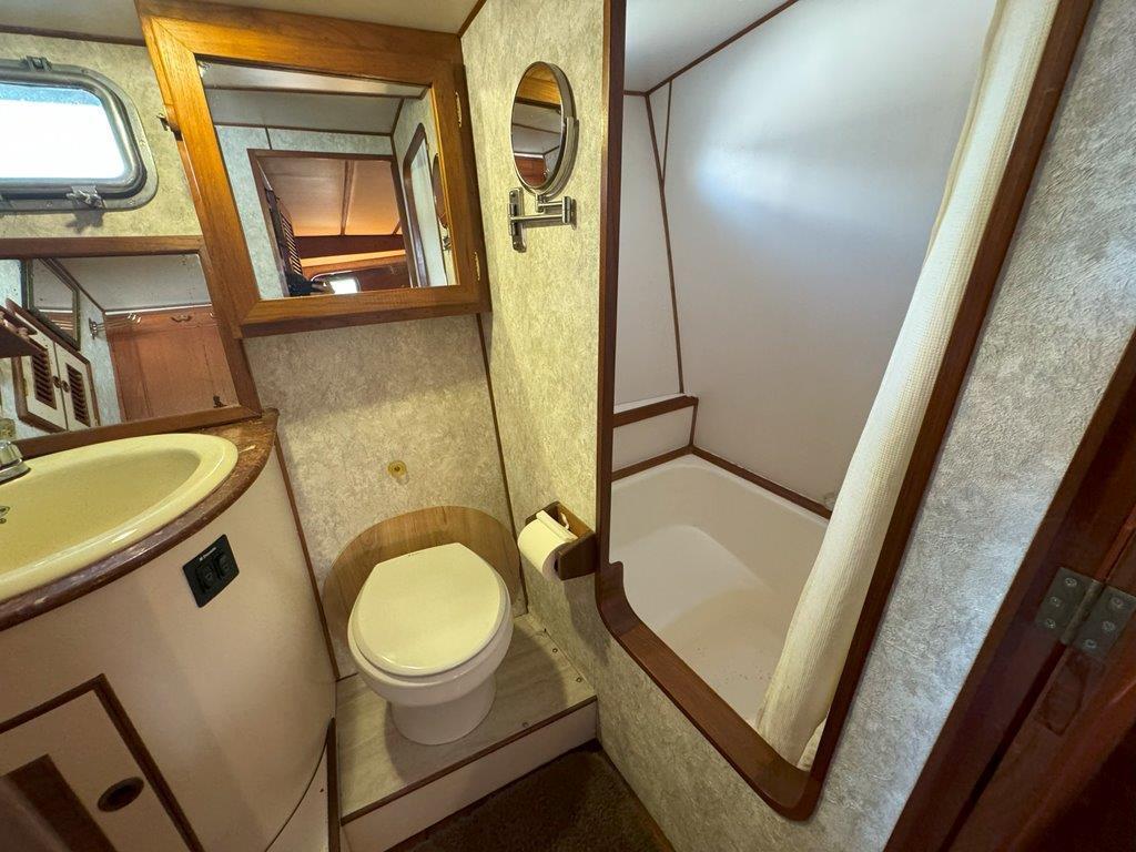 Ocean Alexander-50 MK1 1980 -WA-US-1980 Ocean Alexander 50 MK1 yacht bathroom with toilet, sink, and shower.-9725618 | Thumbnail