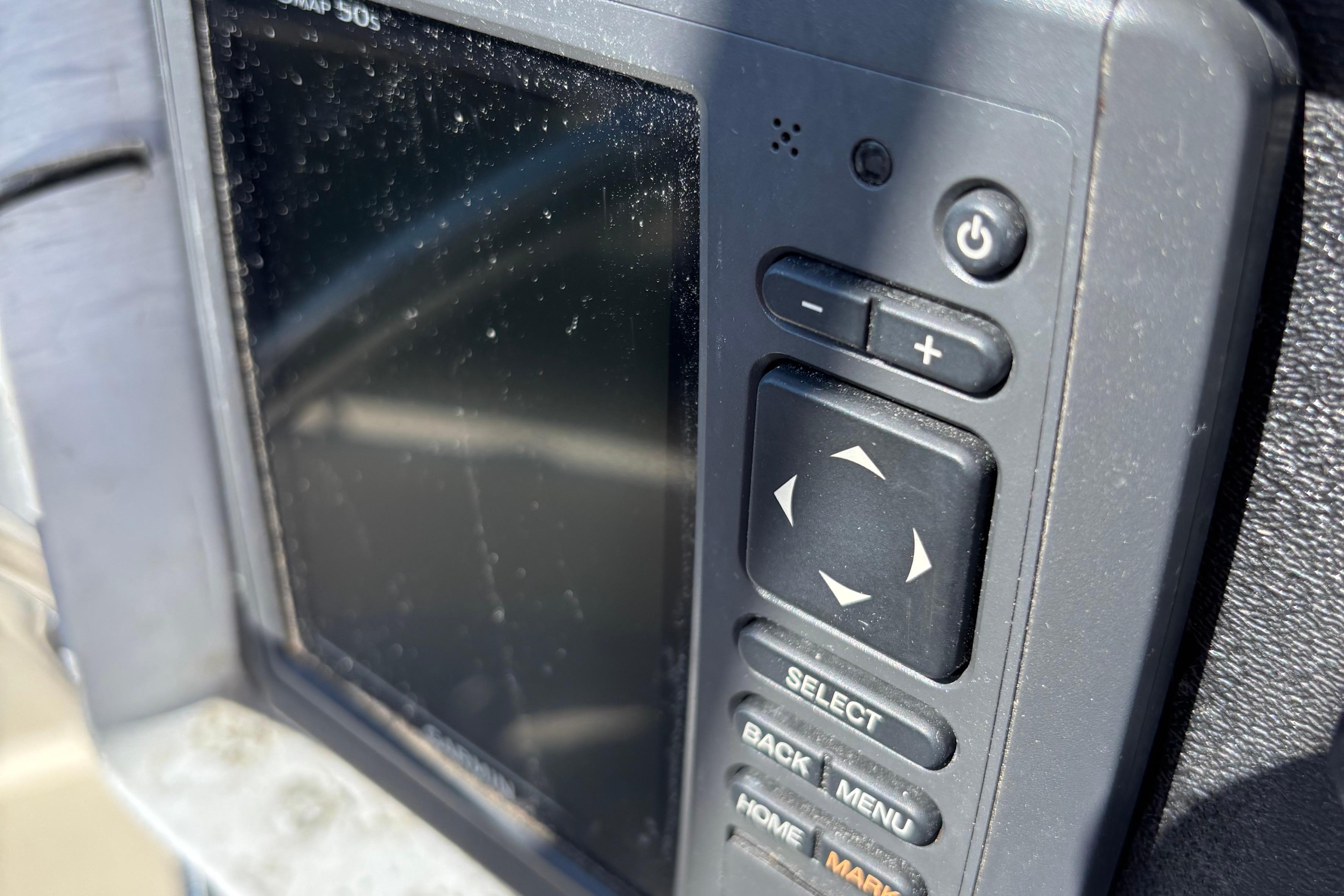 Close-up of a marine GPS device on a 1981 O'Day 34 sailboat.