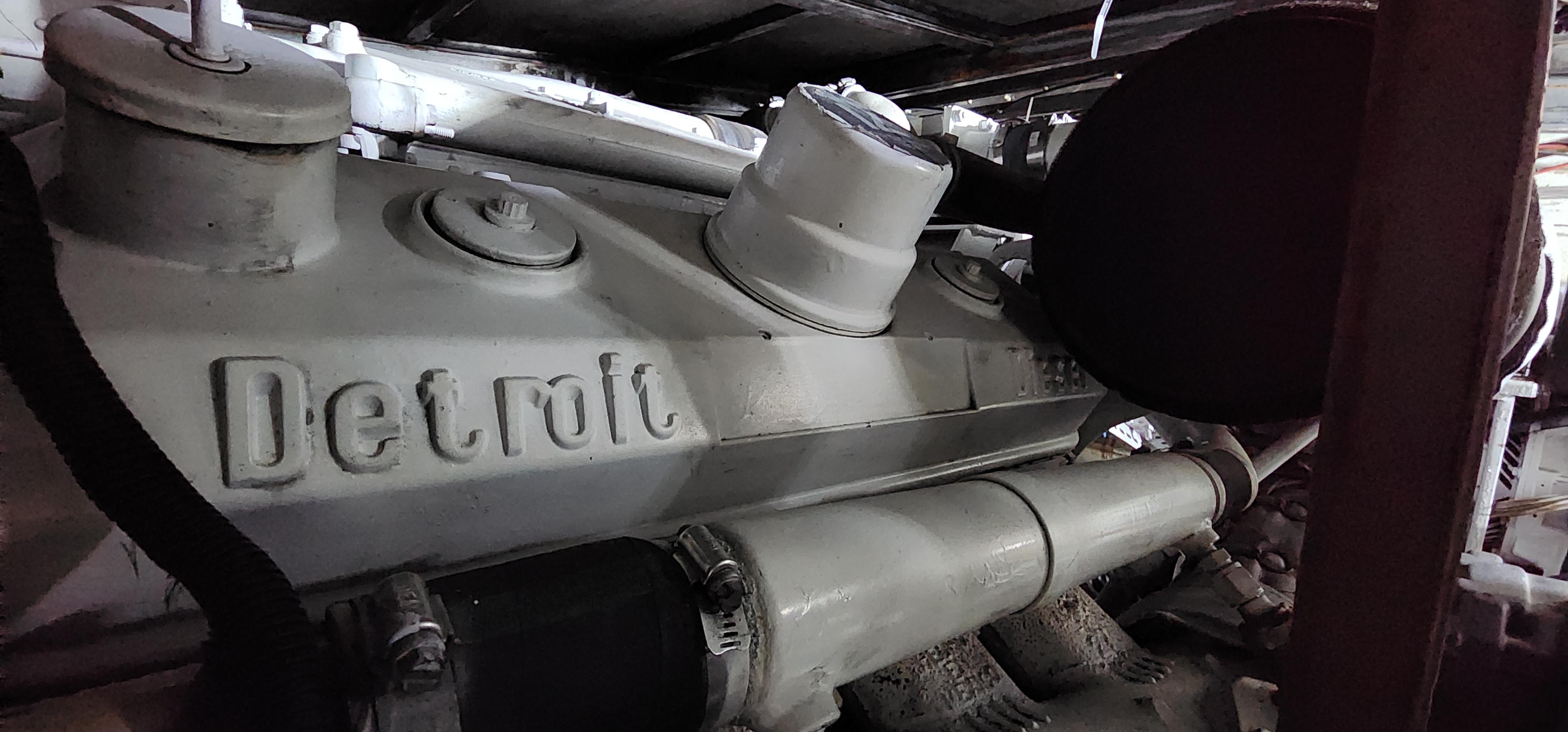 Engine of a 1978 Hatteras Sportfish boat, featuring a Detroit Diesel engine.