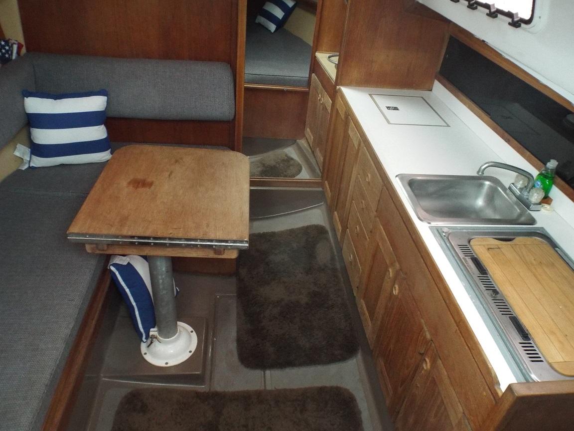 galley to starboard and settee to port