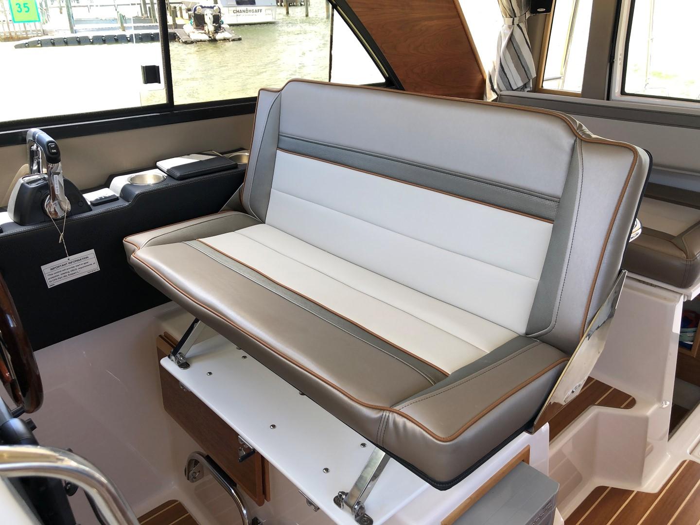 Cutwater-C-32 CB 2025-C32 CB 2025 FL-US-2025 Cutwater C-32 CB interior with cushioned seating and modern design.-9832181 | Thumbnail